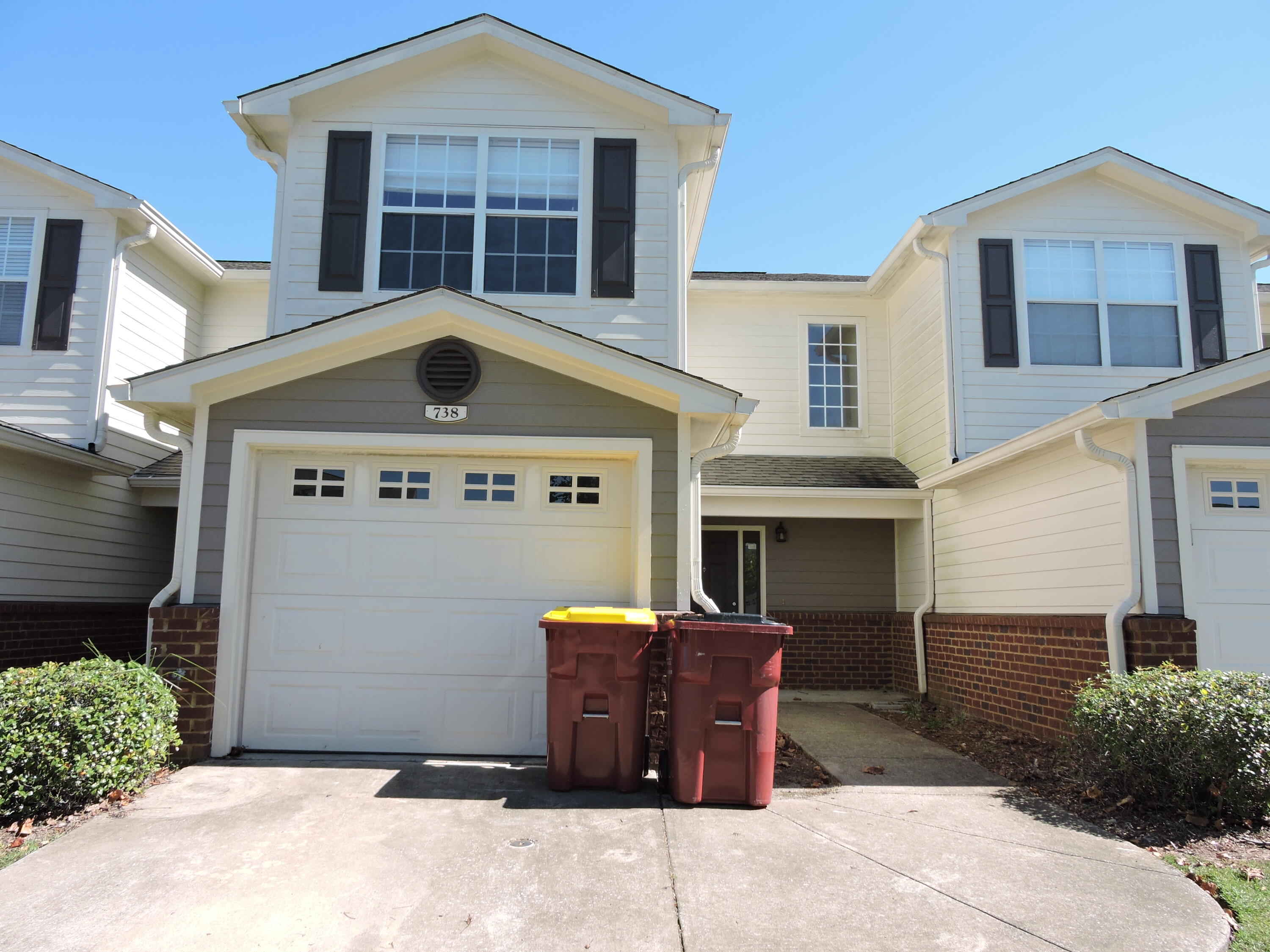 Available Now! 3 bedroom 2.5 bath townhouse that overlooks the POOL/playground & walking trail in Eagle's Landing which is located south of I-10; Easy commute to all bases, beaches and shopping. This well developed community consists of a nature preservation area with nature trails, a gazebo, a large community pool, clubhouse, sidewalks, and underground utilities. The interior has been freshly painted in neutral colors. The entryway, kitchen, and all bathrooms have low-maintenance tile floors. Crown molding adds a touch of elegance. This unit includes a side by side refrigerator, dishwasher, microwave, stove and garbage disposal. The pass-through from the kitchen to the living room makes entertaining easy. Laundry area on first floor and 1 car garage has opener for easy parking.