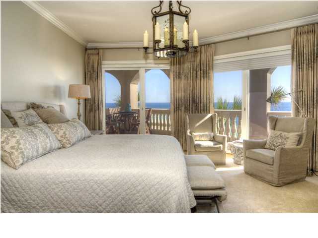 Coastal elegance on the beach awaits you. Rarely does a Bella Vita direct gulf front condominium home become available. Step in to this beautiful and thoughtfully designed residence and walk out to the pools and piazza amidst a back drop of endless blue waters and sky with 365 feet of private beach. Arches reveal picturesque views of sea and sky and a substantial white concrete balustrade offers a richness and privacy. The interior soothing color palette creates a calming atmosphere beckoning you to relax and embrace the beach, as well as loved ones and most favored friends. Your luxurious four bedroom, four and one-half bath condominium home lives like a beach house and offers two gulf front master bedrooms and two large guest suites with private baths. The living room features a