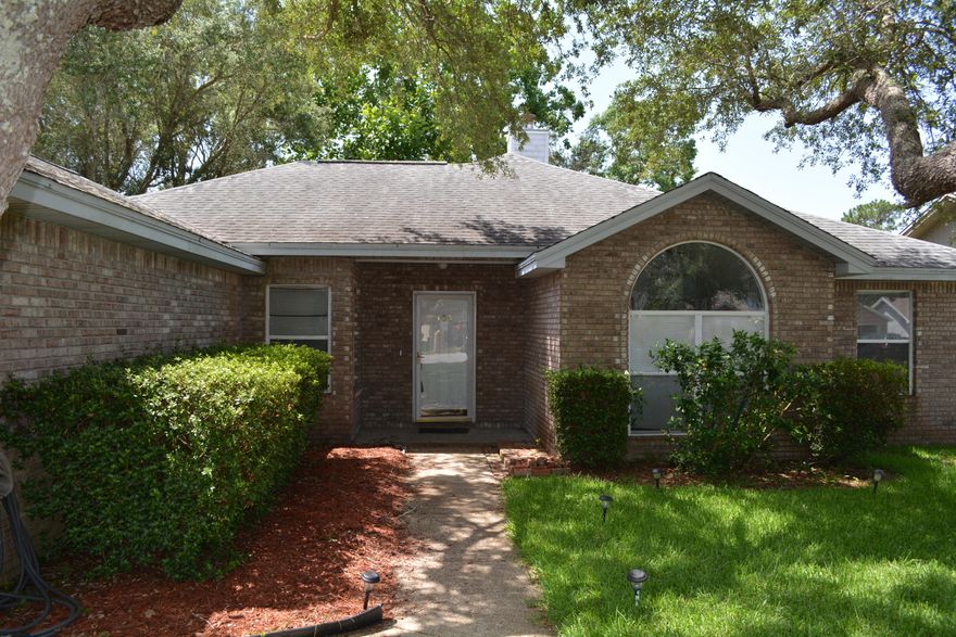UNDER $140 per sq. ft in Bluewater! This is your chance to get an all brick, one level home in the highly desireable Bluewater Bay area. This home features 3 bedrooms/ 2 baths plus an added on Florida room that is heated and cooled. Formal dining room and laundry room as well as a double garage. Large kitchen has tons of potential. 2019 updates include new stainless steel appliances. Master is large and ensuite has two separate vanities. New tiled shower. New LVP flooring throughout. New guest bathroom tub and shower surround. New ceiling fans and light fixtures. See upgrade list for more information. Great backyard and quiet neighborhood. Home is being sold as-is and priced accordingly.