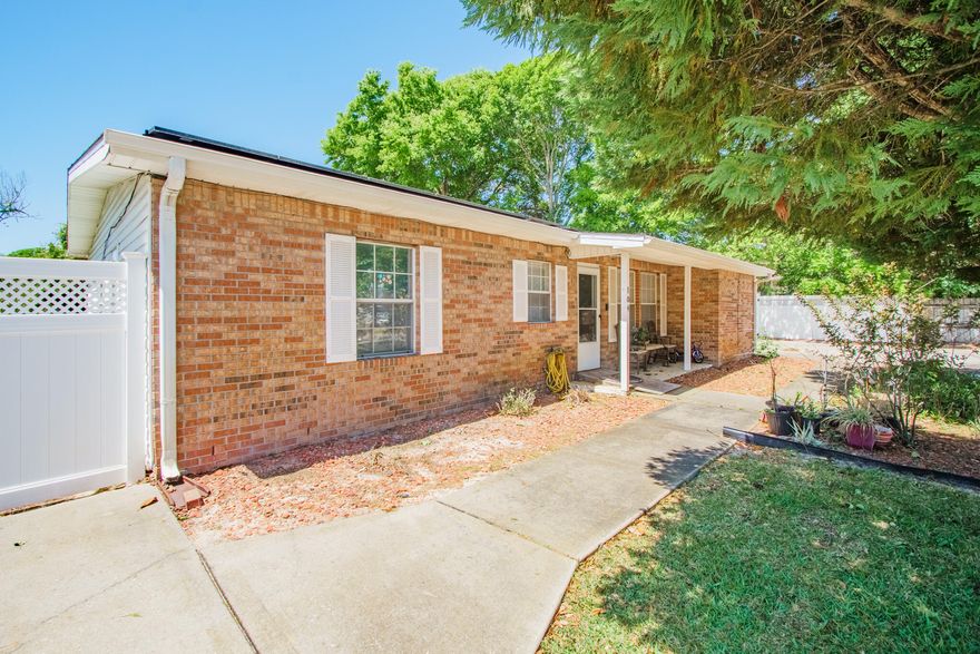 Come see this updated affordable 3 bedroom 2 bath split bedroom home within a very short walking distance to 4 schools. According to the property appraisers website this house was remodeled in 1998 ( copper wiring too )  with an updated effective build date of 1990. The roof was replaced in 2014 and the water heater in the last few years as well as the a/c. The solar panels were installed in 2020  and they are paid off so your power bill is super low. The kitchen has soft close drawers, solid surface counter tops and newer appliances. There is also an extra driveway to park your boat or RV along with a 20x20 block shop in the backyard with power and the possibility of making a backyard apartment.  Call to make an appointment to view this great family home.