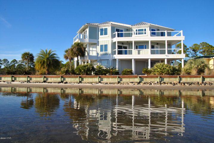 Spectacular waterfront on peninsula with stunning views unmatched this side of Hathaway Bridge survived cat 5 hurricane. Built directly on 170 feet of Bay front and surrounded by water with a beautiful marsh on one side. This luxury home custom built by Rita Jones has the ultimate privacy with unobstructed views in every direction with Brazilian hardwood floors throughout level 3. Careful designing was crafted to ensure sunrise and sunset views in the main living area as well as master bedroom. The main living area has HUGE open concept to dining, kitchen, and living area feeling like you are WALKING ON WATER.