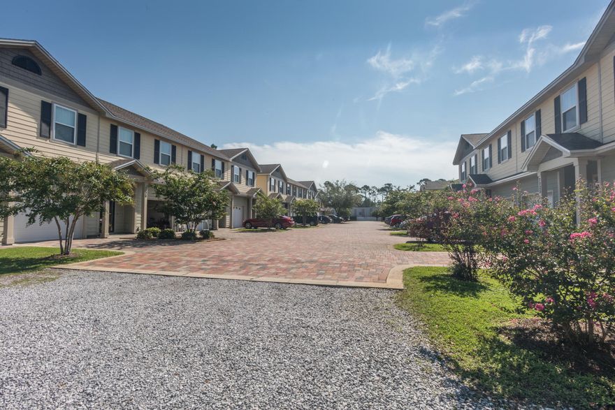 This beautiful 3 bedroom 2 1/2 bath townhome is move in ready. It is located close to town and right across from the Navy Base. The owners have added a screened in porch for your enjoyment. The one car garage allows for extra storage. The community pool& gym are just steps away and the complex has plenty of parking for your guests. Call for your private showing today!