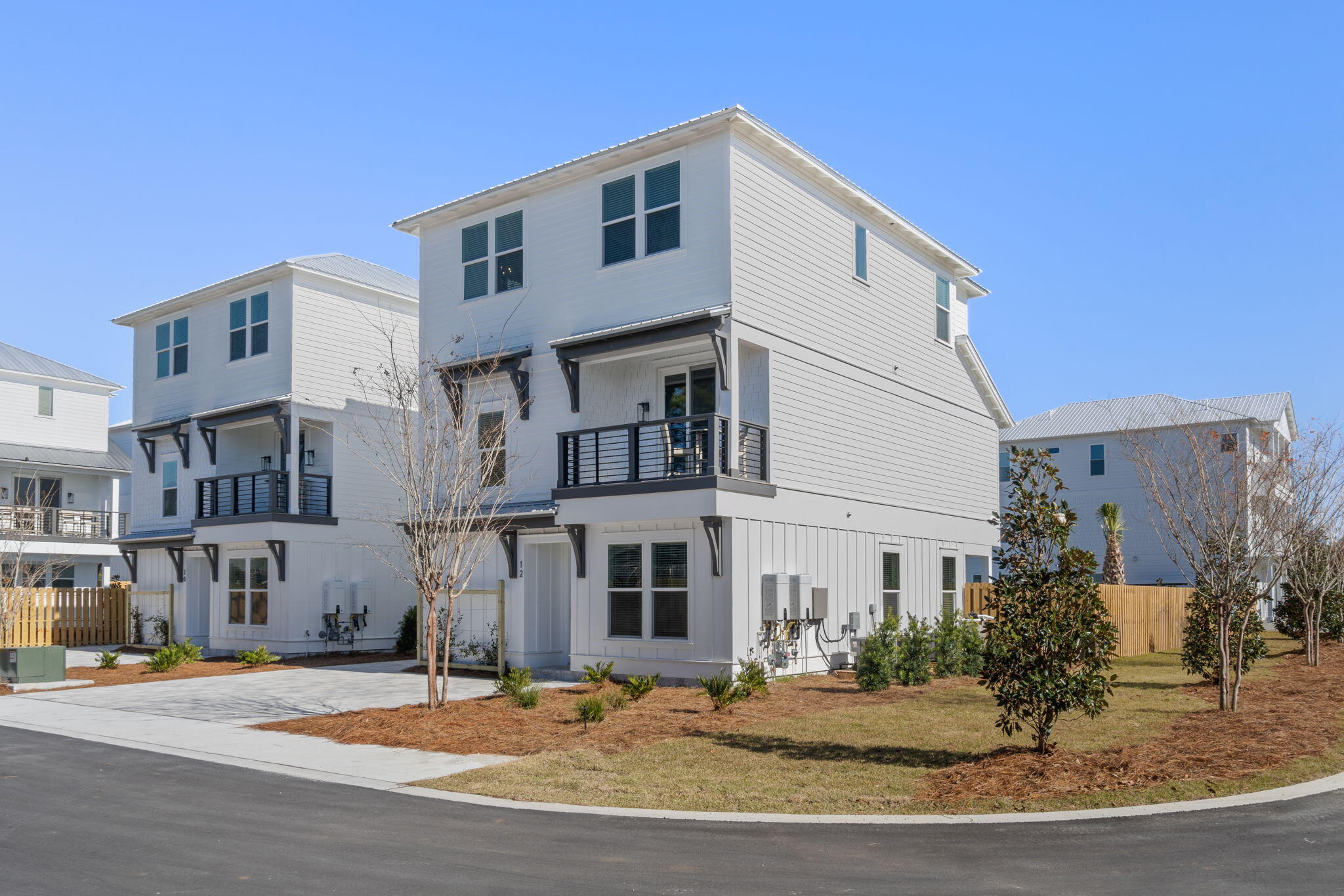 BRAND NEW construction complete! Welcome to Blue Ohana, 12 N Payne. The first of 8 true luxury investment built homes. Elevating the essence of modern coastal chic, these residences are masterfully designed to optimize short-term rental returns while offering an unparalleled guest experience. Each expansive 2,998 square foot home features 7 elegantly appointed bedrooms, each with its own luxurious ensuite bathroom. The multiple common areas are perfect for entertaining, equipped with wet bars and chef-worthy kitchens featuring high-end GE Monogram appliances, including a gas range and tankless water heaters.Professionally curated interiors boast furnishings from Pottery Barn and Williams Sonoma, creating a sophisticated yet inviting ambiance. Outdoors, indulge in the ultimate relaxation with a spacious 20x10 private heated gunite pool that completes this luxurious haven, ensuring an exceptional experience for both investors and guests alike. Projections from $165-180k+ with management in place and ready to go!