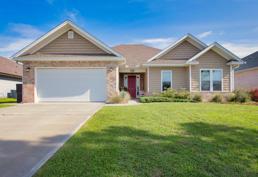 Back on the market at no fault of the sellers. This gorgeous home offers a spacious and airy ambiance, complete with hurricane-IMPACT windows, lofty ceiling, and custom 8-foot interior doors! The open floor plan is perfect for hosting gatherings, featuring an elegant trey ceiling, recessed lighting, and a stunning kitchen with a large island, granite countertops, tiled backsplash, and stainless-steel appliances. The primary suite is sure to capture your heart, featuring a second trey ceiling and an en-suite bathroom with separate vanities, a tiled walk-in shower, garden tub, and a massive closet with ample storage space. The backyard is fully fenced with a split section and includes a broad gate that offers ample clearance and easy access for parking your