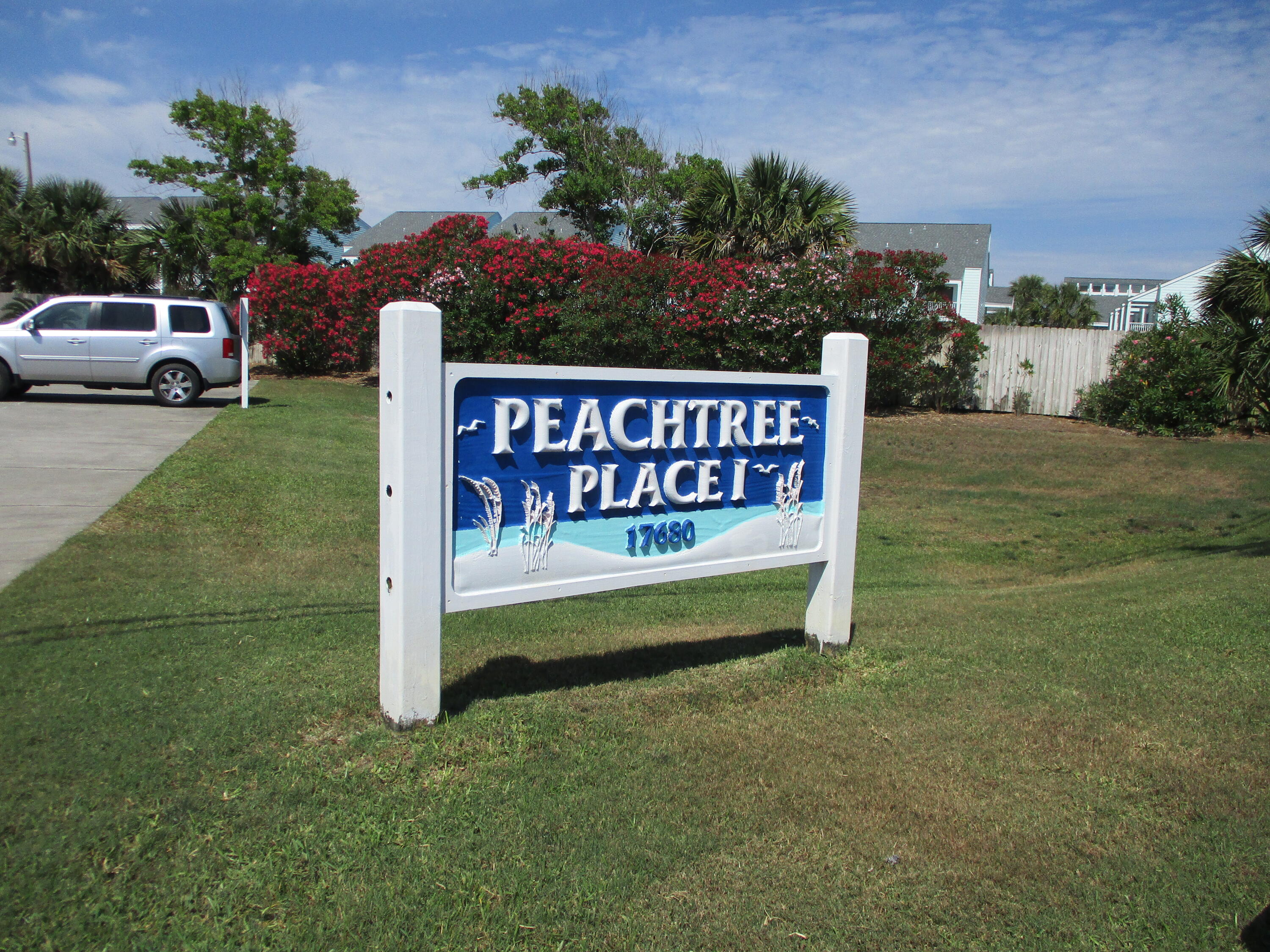Walk to the beach - approximately 130 steps and you are looking at the crystal blue waters of Panama City Beach! Enjoy this west end condo, cute as a button and fully furnished! This is a corner unit, which is larger and has more windows and rarely comes on the market. Move in ready, well maintained, freshly painted, full size washer and dryer and sleeper sofa. Best of all - you have a wrap balcony that overlooks the pool, and the back area will never be built on. You even can see the gulf from your front porch area and your balcony! Peachtree Place is a low destiny condo complex with pool, grills, shuffleboard, basketball court, and directly across from your beach walkover. Call today to see this great condo! Short term rentals allowed.