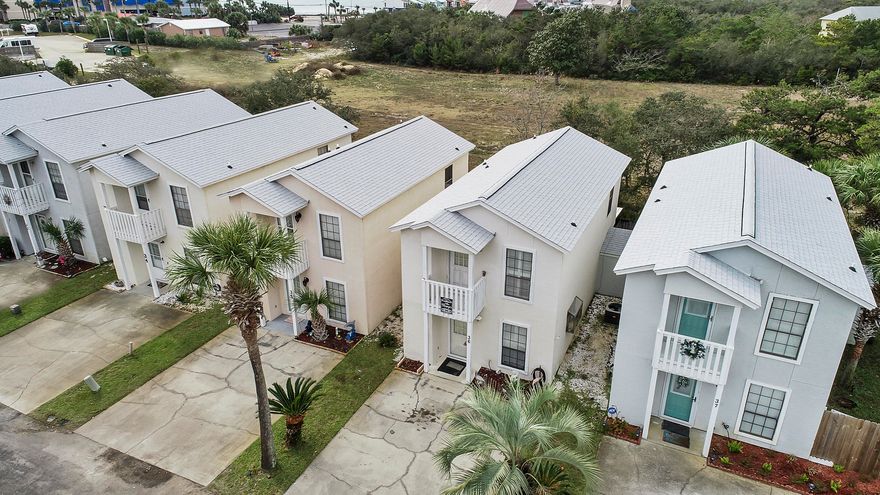 Affordable 2 Bedroom 2½ Bath Just a Short Walk Across the street to the White Sandy Beaches and Emerald Water of the Gulf of Mexico. This is listed as a Condo but is a detached unit. The unit Features a large kitchen with Plenty of Cabinet & Counter Space, Washer & Dryer, Dinning Area, Fenced in Back Porch and Outside deck off the front Bedroom. This Small Complex includes 2 Pools, a Club House & Low Homeowners Fee. Located on the Popular West end of the Beach. Close to Pier Park, Shopping & Dinning. These units do not come on the Market Often. Call your agent today to schedule a visit. All ages, measurements and room sizes approximate. Please verify if important.