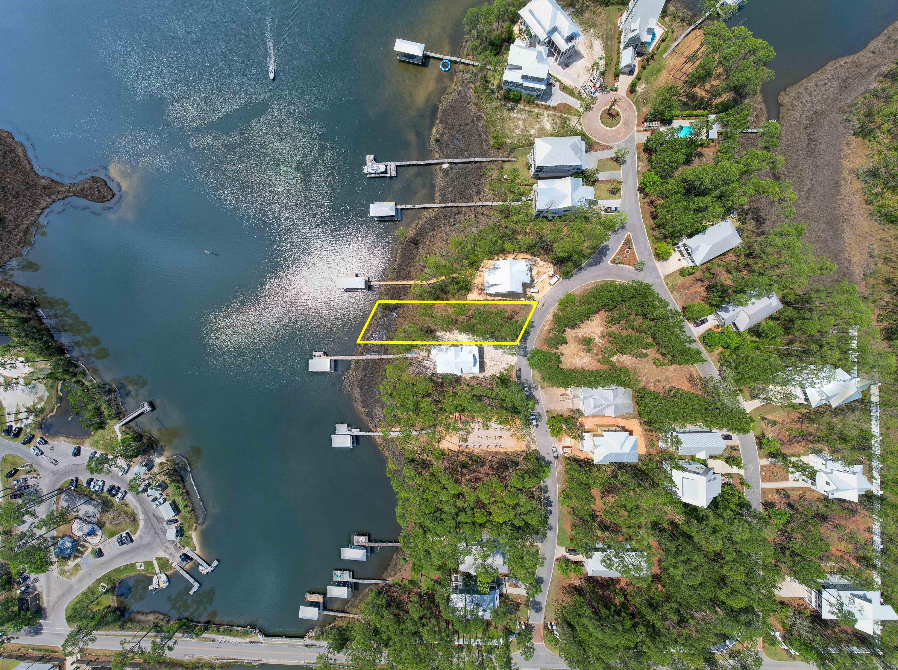 Florida living at it's finest! Yes, it's time to build your waterfront dream home close to the sugar white sands of the Emerald Coast in historic Santa Rosa Beach. Great bayside lot with 63' of waterfront and an amazing southwesterly view perfect for enjoying afternoon sunsets. Plus, this exclusive gated community offers a pool, dock and picnic area for residents. Water & sewer taps have been paid. Bring your jet skis, paddleboard, boat and your building plans! This property is ready for you!