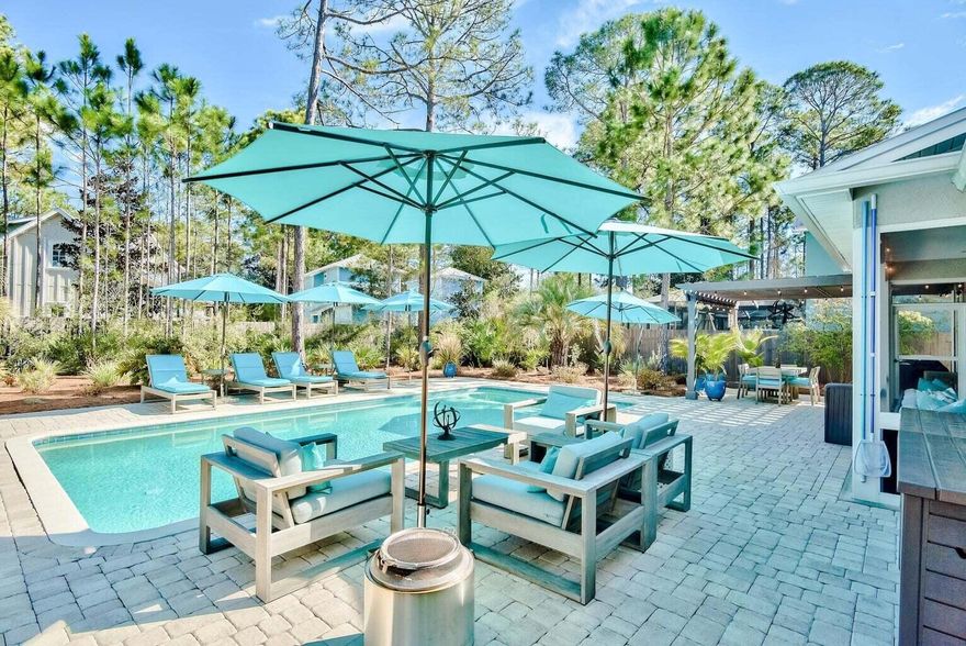Beautifully updated Ranch style home in the amazing Sugarwood Beach community sits on the largest usable lot in the neighborhood. The backyard is private & has a saline, heated pool with smart controls. An exterior, private, open-air full bath adds a sense of luxury & ease. The beautiful Pergola & paved patio lead inside through the screened entertainment porch. Windows & doors are impact rated, added in 2020, along with the metal roof. Upgrades are abundant. Enjoy zoned living with capability of privacy shutout for guest bedrooms & bath, while the Master Suite resides in its own wing. This is a rare opportunity for open, one-story living, with an extra-large preserve of Seagrove paradise out the back door.