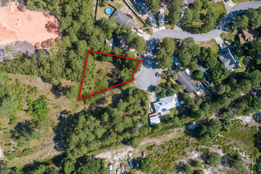 Gorgeous piece of property, located in the prime spot on Highway 98. A short driving distance to all the fun and action 30a has to offer, while still being only 5 minutes from Miramar Beach and Sandestin, and only 20 minutes from Destin! Build your dream home or build an investment property close to 30a!