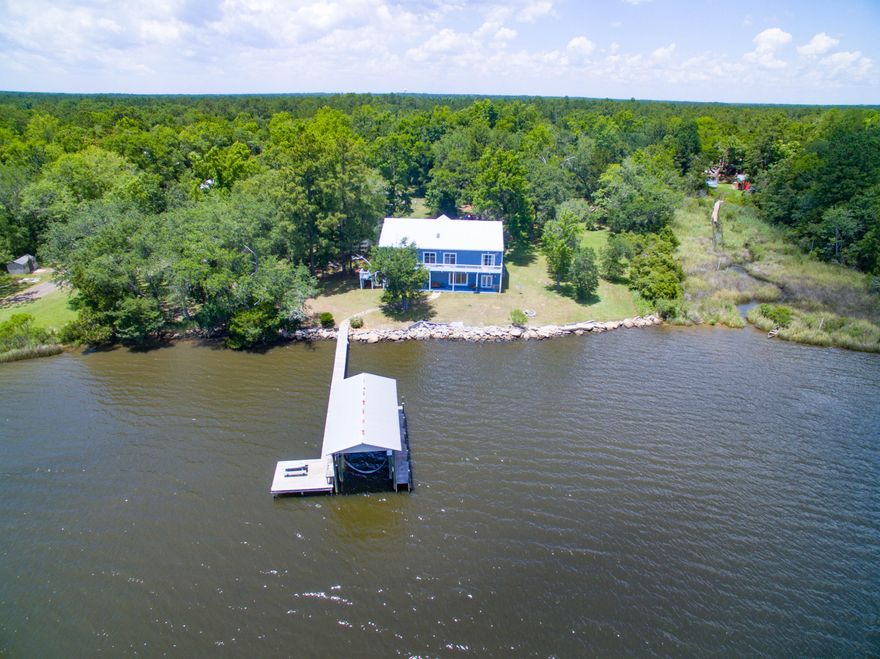 SELLER SAID REDUCED....GRAND WATERFRONT ESTATE! Gorgeous home on huge wooded lot with over 227.06 waterfront feet on Lagrange Bayou. 3.32 acres.Looking for backup contract or 24 hrs to remove contingencies, move forward or go into backup position.