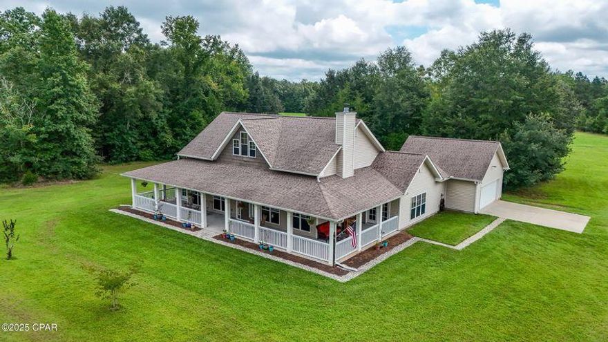 Discover the perfect blend of country living and business opportunity on this 29.15-acre farm just north of Marianna. The 2,756 sq ft single-level home, built in 2018, features 3 bedrooms, 2 baths, and a spacious master suite with sitting room, garden tub, and two walk-in closets. The gourmet kitchen boasts granite countertops, walk-in pantry, and a commercial-style hood with grease trap. Enjoy Starlink internet, an RV plug, and a backyard fire pit for relaxing evenings. The property includes: -Orchard and vineyard with muscadine grapes, fig, pear, plum, nectarine & olive trees. -Fishing pond with bridge and plumbing -Fully fenced horse corral with water, power, 2-stall barn, and lunging area -Approx. 4 acres of pasture for grazing or planting -Trails and wooded areas ideal for hunting or recreation -8' x 14' greenhouse with power, water, and fenced garden -Three compost bins and multiple irrigated zones. A separate building contains a single apartment with a full kitchen, a full bath with shower and a bedroom that is 12'x11' with a small closet. This building also has a large storage area that could be used for a variety of things. This is a perfect place for your grounds keeper, guests, additional dwelling unit for family. or even a hobby space. Also included: -75' x 60' metal-roofed shed with 12' ceilings and water -2 wells (for home and outbuildings) -Fully fenced property with gated access This is a rare opportunity for farming, homesteading, or running a business from homeall within minutes of town conveniences.