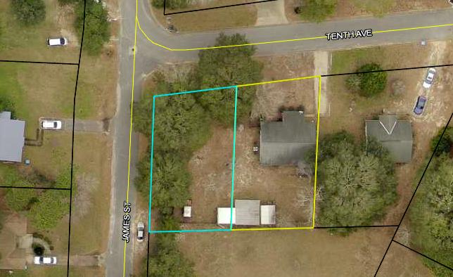 Cleared, fenced lot in a quiet neighborhood in NW Crestview. Yard shed included. Perfect opportunity to build a home!