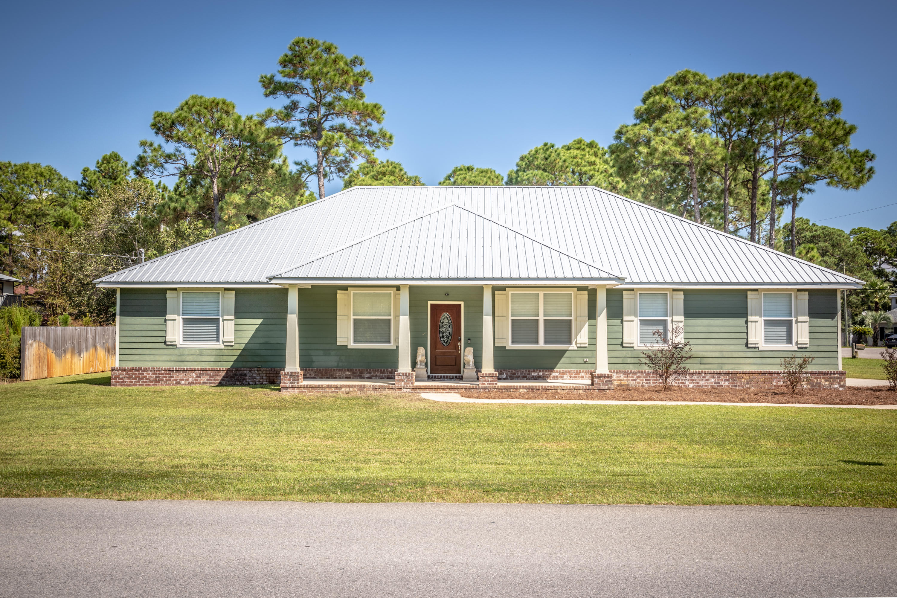 STOP searching - you've found ''the one'' right here! Recently build in 2015, this newer home in Miramar Beach is an opportunity not to be missed. 4 beds/2.5 baths, over 2400 sq. ft. on a 1/4 acre corner lot. Features include a LARGE master suite w/his & hers walk in closets, master bath with separate shower & garden tub, oversized garage, large living room, split floorplan, open kitchen that opens to the dining room on one side and a big breakfast area on the other, built of durable hardi plank and metal roof, and more. Recent sales in the neighborhood are $10/sq.ft. higher than this one and it's priced to go FAST. Located 1 block from the bay, minutes from the beach, and surrounded by all the shopping dining and entertainment that South Walton has to offer. Conveniently located 10