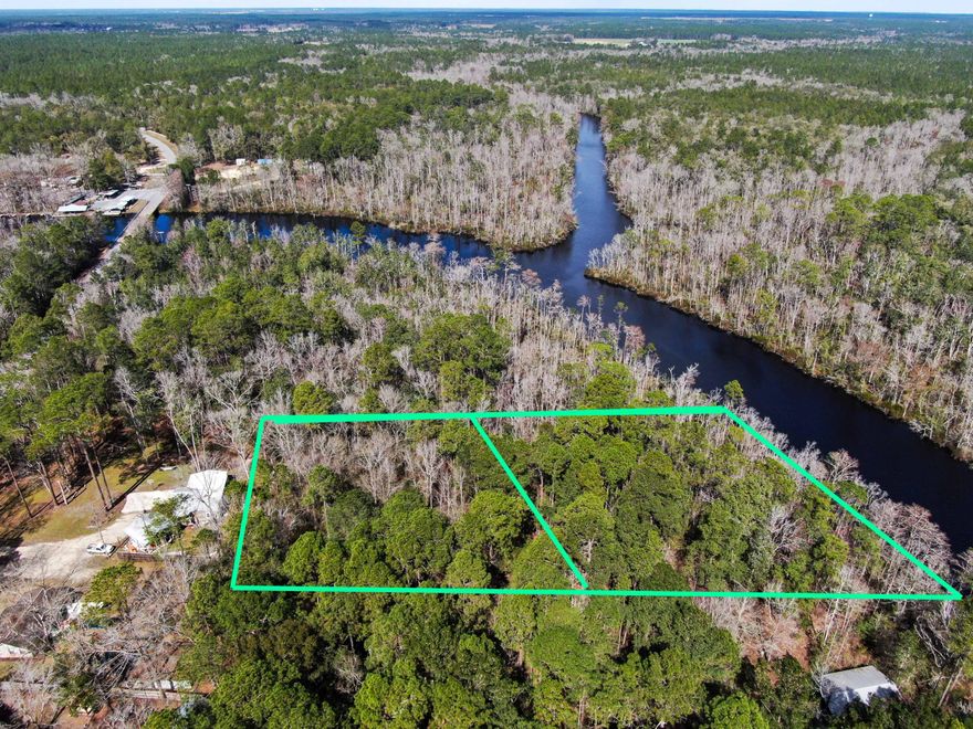 INCREDIBLE WATERFRONT OPPORTUNITY! Zoned GENERAL COMMERCIAL! Live along majestic Black Creek or build your waterfront business. Amazing location in unincorporated Freeport, east of 331! Unlike many waterways in the area, Black Creek is both navigable for large boats and yet very peaceful without major boat traffic. Build your country retreat or business and waterfront dock only 25 minutes from 30A. Listing price is for 2 lots of record that are 1 acre each! Build on one acre and sell the other, or create a private compound or business. No HOA -- and public water-sewer just landed in this section of Highway 3280! These parcels are close to what is major portions of Walton County's largest area of private conservation easement lands along Black Creek known as Nokuse conservation lands.