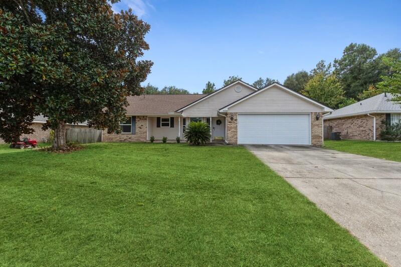 Great home on the South Side of Crestview! This home offers so much from the larger open living space to the cozy enclosed sunroom! When you enter the home you have a open floor plan that gives the already spacious living an even more grand feeling! The living space has tall ceilings and open built in shelving! Off from thriving space out the backdoor you have an enclosed porch/sunroom! This space is light and bright and can be used for a variety of things. Entering the primary bedroom you will find a larger space that flows well into the en suite. Roof 2018Windows 2022Septic pumped 2022 Garage door/opener 2022