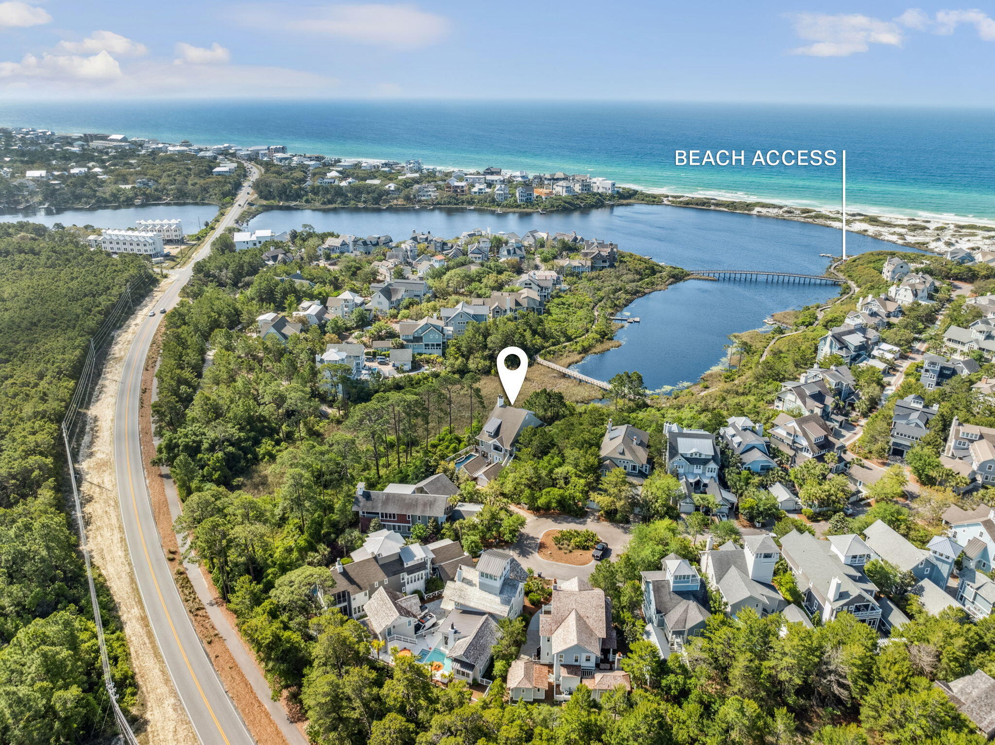 Experience the pinnacle of coastal living in this breathtaking, lakefront home, nestled in the sought-after gated community of Watersound Beach on 30A. Boasting panoramic Gulf views and a perfect blend of privacy, luxury, and design, this 5-bedroom residence is an entertainer's dream. The home features four spacious king-sized ensuite bedrooms plus a super bunk room with four queensized bunks for large families or guests. The upstairs living area, centered around a gas fireplace, serves as the perfect gathering space for family and friends after a day spent exploring over a mile of pristine Gulf-front beach and the stunning dunes of Watersound. The gourmet kitchen is a chef's delight with a large island and space for multiple cooks while enjoying breathtaking views. There is so much more! The open-concept living and dining areas also offer sweeping views of the water, while expansive porches on every level totaling over 1,000 square feet provide ideal outdoor spaces for relaxation and entertainment. For added enjoyment, the lower level features a media room and game area, creating a dedicated space for fun, family bonding, and entertainment. The private heated pool with upgraded glass tile and fountains is a true oasis, offering the perfect spot to unwind and enjoy the serene surroundings. This exceptional home offers all the amenities for luxury coastal living from the large outdoor living areas to the stunning lakefront location with unparalleled Gulf views. This is what you have been searching for!
