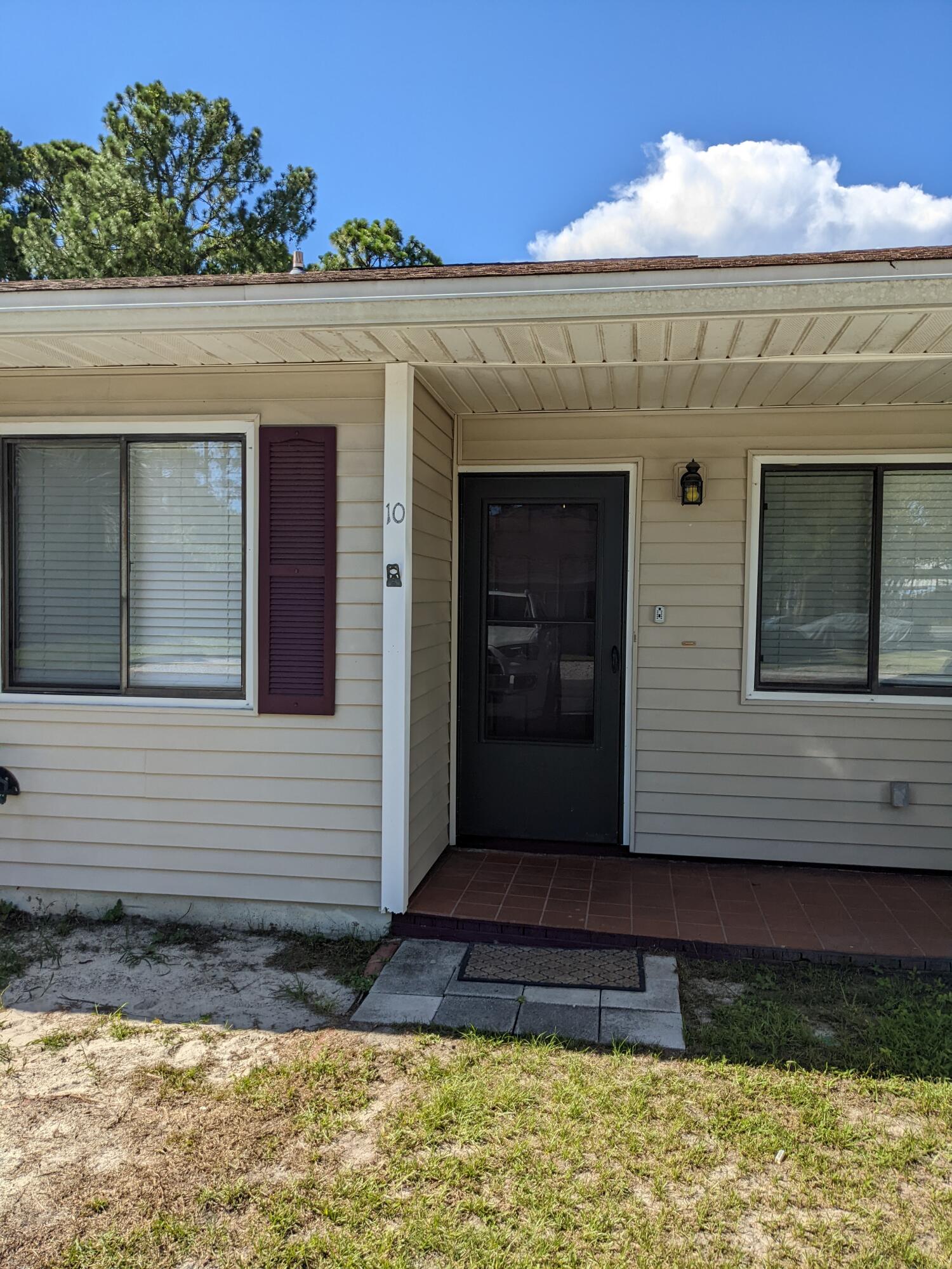 Nice townhouse with quartz counter top, oven, microwave and dishwasher just over a year old, lvp and tile floors, move in ready. Private back yard is fenced in with a storage shed. New roof in 2015, ac less than 1 year old. HOA is $55/month, includes common area insurance, lawn care and external pest control. Unit has been great as a long term rental or would make a great starter home.Cash, with right to inspect.