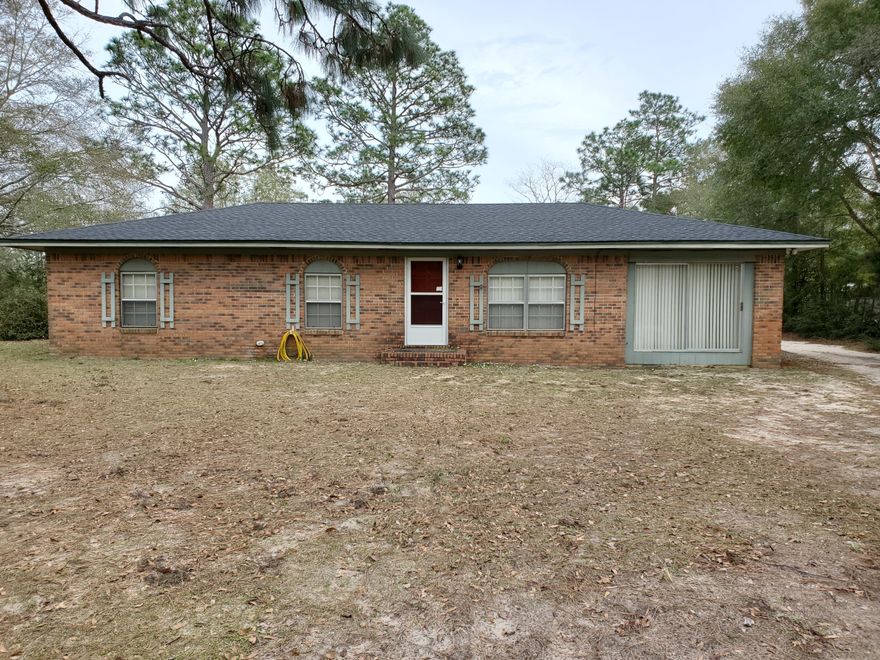Welcome to your quiet country get-away! This is a great 1.25 acre lot at the end of a dead end street featuring a comfortable 1855 square foot house, a 34' x 18' workshop, and two 20' x 18' shelters for your car & boat. 
The original house has a 350 sq. ft. addition (built in 2007) which serves very well as a master bedroom, with an adjoining sunroom and quick access to the hot tub! The family room could also easily serve as a fifth bedroom if needed. Oh, and did I mention the roof is only six months old?
The large deck is weathered but functional, and is conveniently accessed from the kitchen & dining area. The workshop has concrete slab floor, electricity, water, and the center section has ceiling fans & air conditioning! Come take a look. The only thing this property is missing is you!