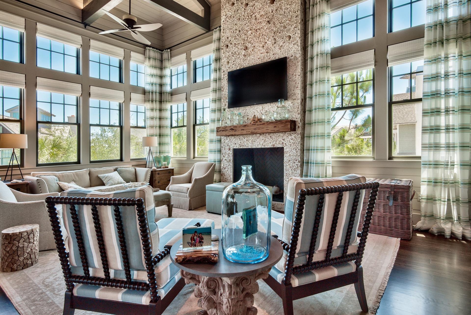 HUGE REDUCTION! This magnificent home is truly a rare opportunity in Watersound Beach. There are amazing panoramic views of both the Gulf of Mexico & Camp Creek Lake from the 3rd Floor & oversized tower. It was designed by Thurber Architecture & built by Rice Construction and backs up to a green buffer. Located just steps from the beach it exudes coastal elegance at its finest in a very private setting. The professionally decorated interiors encompass extraordinary finishes & attention to detail. On the first floor one will be impressed with the size and proportion of the three guest suites & corresponding ensuite baths. One of the bedrooms is a master which includes a master bath with elaborate marble & tile. Ascend the stairway and find an abundance of natural light streaming through the plethora of windows in the living area with 20' cathedral ceilings. The light accents the wood flooring, reclaimed beams and tabby fireplace. The large and inviting gourmet kitchen includes pecky cypress cabinets and all of the highest end accoutrements. The second master bedroom with its raised ceilings will be the envy of your neighbors. It includes a stacked washer and dryer in the closet and an inspired master bath worthy of spa status. The third floor includes a bonus bedroom. No element has been overlooked including the multiple outdoor living spaces that allow for plenty of space for eating, relaxing and entertaining. There is a 2 car garage and air conditioned storage area that could easily be converted into a study. Beautifully designed to be an extension of the interior spaces, these gathering areas allow for outdoor living on a sensational scale. Other interior finishes include custom millwork, pecky cypress doors and ceilings, shiplap walls and marble countertops and flooring. Come view this spectacular property today!