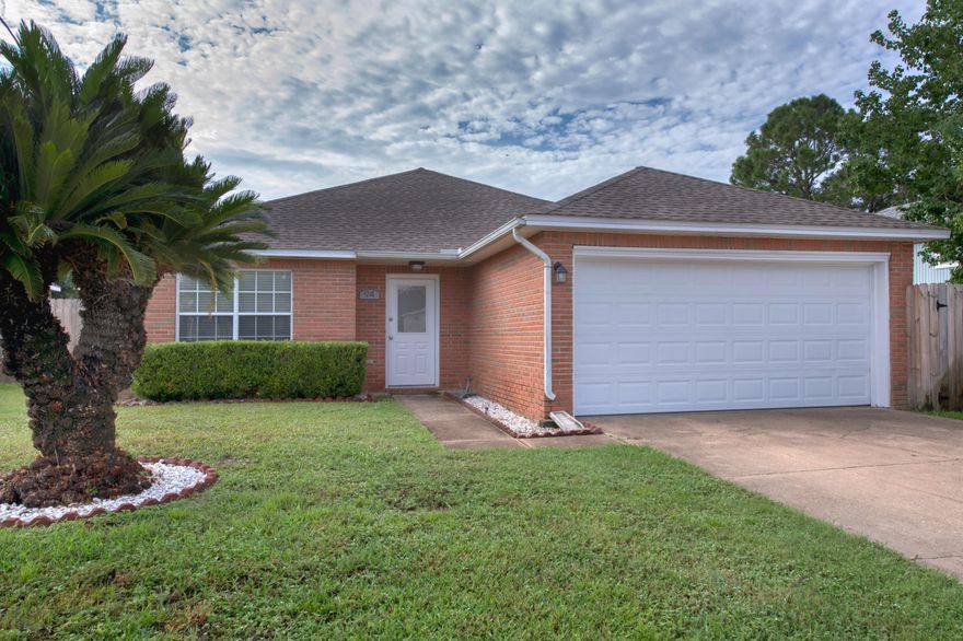 Live in the heart of Destin in a home featuring travertine floors, granite countertops, and a lush, privacy fenced backyard. The new solar system equates to huge monthly savings even in the peak of summer. Roof and water heater were installed 2017!  Minutes away from Main Street Park, beaches, shopping, and restaurants.  Home warranty provided and seller will contribute to buyers' closing costs.