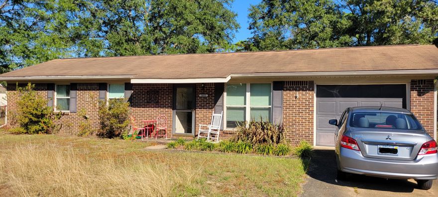 Nice 3 Bedroom, 2 bath ranch style home sitting on nearly an acre lot. Interior of house is in good condition but needs a little cosmetic TLC. Lot is level with mature trees, rose bushes, storage building, and chicken coop.  Square footage listed does not include the 200 sq ft Florida room. Buyer to verify all measurements. Property is being sold ''as is''.
