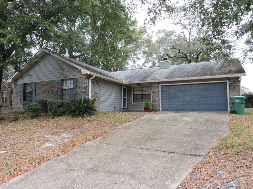 GREAT LOCATION!! SOUTH OF I-10 & CLOSE TO ALL BASES, SHOPPING, BEACHES ETC. Well maintained 3 or 4 BR, 2 Bath, 1368 sf. Unique split bedroom design, step into home on tiled foyer & hall leading to 3 of the bedrooms with hall bath to the left and the family room, dining, kitchen & master bedroom will be to the right. Large dining & family room with fireplace. Carpet in family & 2 bedrooms, hardwood in master & office/den with tile in dining, kitchen & baths. Skylights in both baths, plenty of light in kitchen. Lots of nice touches, chair rail, wainscoting, Spanish lace walls. TV will remain that is on the wall in office/den- AS IS. Nice workshop out back w/remote. THERE'S MORE, SO MAKE YOUR APPOINTMENT TODAY!!! **** NOTE: THIS IS A NO PETS & NON-SMOKERS HOME ONLY!!