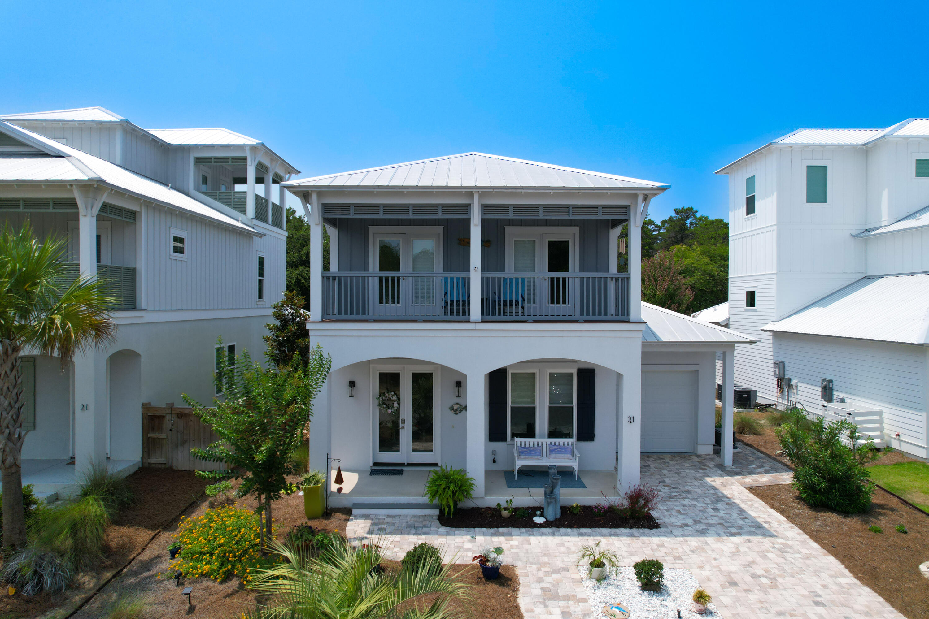 Welcome to 31 W Willow Mist. This stunning coastal-style abode is located in the beautiful community of the Preserve at Inlet Beach. This home was carefully thought out and built with high quality materials and finishes throughout the home for the best possible living experience in mind, with an open floor plan concept making it spacious and airy. This home is equipped with 2 master bedrooms with both having an en-suite, 1 on the first level and another on the second, totaling 4 bedrooms with an adjoining balcony with views for your enjoyment and extra outdoor space. You will also find a spacious screened in back porch perfect for outdoor entertaining.