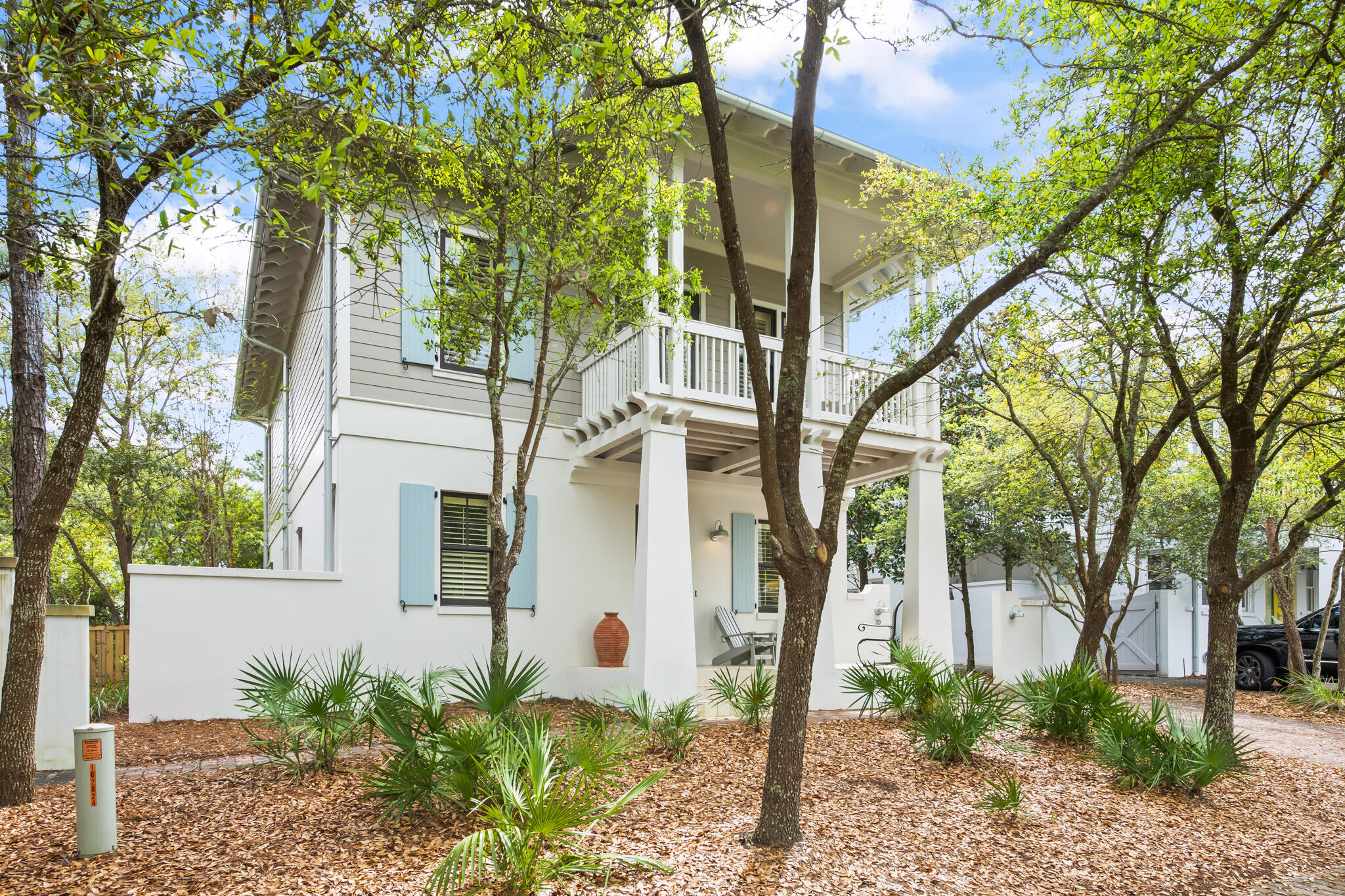 Welcome to 70 Pinecrest Circle, a beautiful 4 bedroom and 5 bathroom home located in Inlet Beach. Pinecrest is a gated community of only 14 homes. The white sand beaches, Rosemary Beach, and 30 Avenue are just steps away. This gorgeous home offers you the best of both worlds: an open floor plan that welcomes inclusive and flexible living, while also having plenty of space to entertain. Perfect as a primary residence OR as a lucrative vacation rental. The first floor welcomes you with, not one, but TWO living areas, a wet bar, full bathroom, and guest bedrooms. Head upstairs to the second floor where you'll find a living/ dining/ kitchen space- perfect for entertaining! The master bedroom is also located on the second floor.