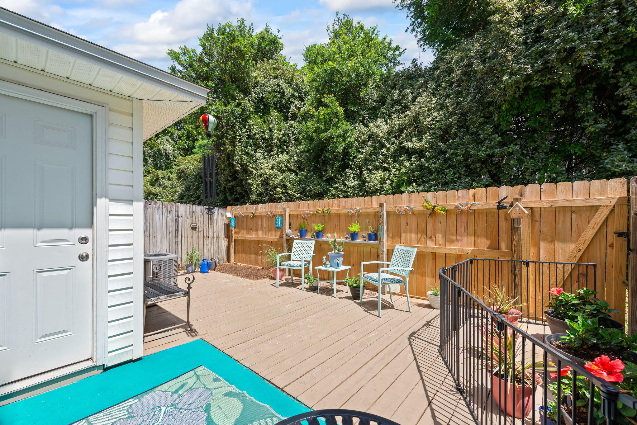 Welcome to your beautifully updated attached single-family home, where beach-inspired living and modern upgrades come together in perfect harmony. This move-in ready gem features all-new luxurious LVP flooring and fresh interior paint throughout, creating a bright and breezy coastal ambiance. The kitchen shines with brand-new stainless steel appliances, freshly painted cabinets, a granite-look countertop, and a generous pantry--perfect for your culinary adventures.Enjoy your mornings with the sunshine streaming through full glass storm doors on both the front and back, and step outside through the sliding glass door onto a charming, fenced-in patio--ideal for relaxing or hosting backyard picnics. A convenient outdoor storage room adds extra space for your beach gear or gardening tools. Upstairs, both bedrooms feature new LVP flooring, while the bathrooms boast elegant marble-look countertops. Multiple closets including extra linen storage provide ample organization solutions. Additional highlights include new ceiling fans, a newer roof (2022), a neutral palette that complements any style, and a private backyard retreat. Located just 6 miles from Navarre Beach and close to Hurlburt Field, shopping, and restaurants, this is coastal living at its best. Garage & storage unit repainted. A 1 car garage and 2 additional parking spaces in the driveway allows for ample parking. HOA maintains the landscaping and termite Bond; New A/C unit in 2024 w/10 yr. warranty. Roof was replaced in 2022! Close distance to restaurants, quick drive to Gulf Breeze and Mary Esther and minutes to the beaches. Garage and storage area recently painted; Don't miss your chance to own this serene and stylish home ,schedule your showing today!