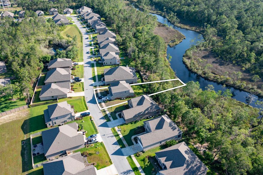 Beautiful Azalea Plan in the community of Peach Creek with 4 bedrooms, 3.5 baths and 2,496 sq ft.. This home is one of the few that  allows a personal dock with direct access to Peach Creek that leads to the Intracoastal and the Choctawhatchee Bay! Original owner selected many upgrades during the building process - Hardwood flooring in kitchen, hallway, foyer, Master and stair treads, painted cabinets, nickel door hardware, whole house window blinds, double French doors to back covered porch & additional dedicated 120 Volt outlet to run electricity to future dock. Master on the Main along with three bedrooms/2 Baths and secondary living space upstairs makes this the perfect family floor plan. Perfectly located to excellent schools, the Beaches of South Walton and all that 30A has to offer.