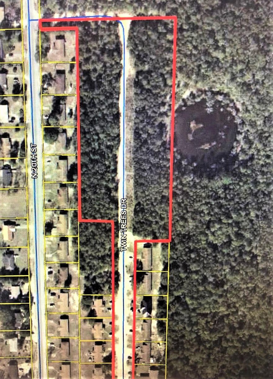 Rare Find!! Great opportunity for a small development. This 4.01 acres of land is complemented with mature trees. Property is zoned residential. This parcel is located in the City limits. All city utilities available. Super convenient location and near Lake Stanley and Back Lake.