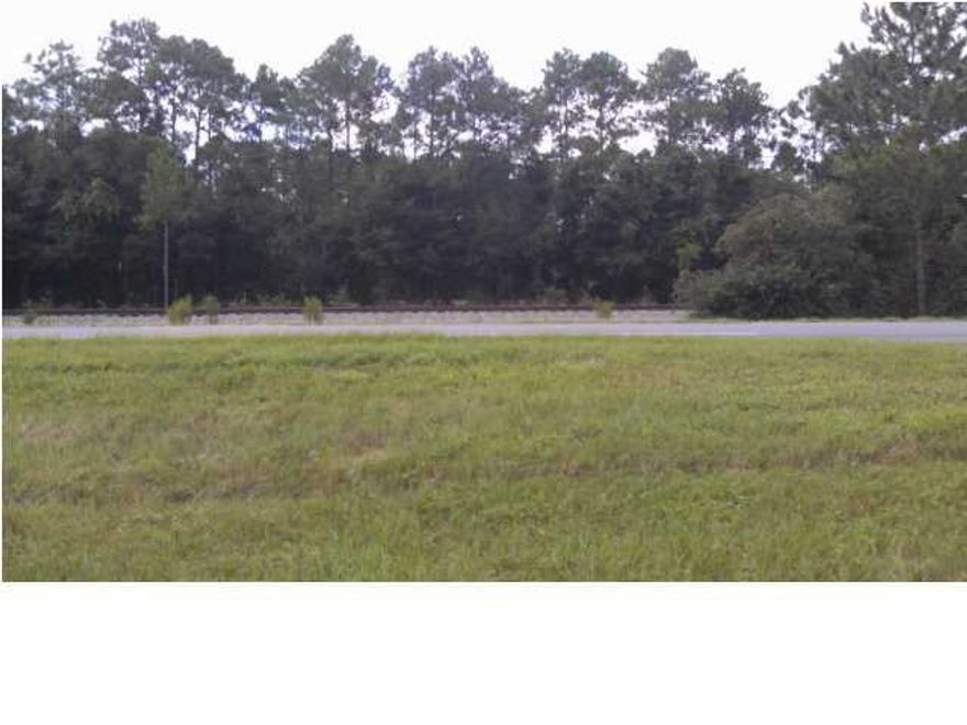 Corner lot between Crestview, Niceville, and DeFuniak!!! ****Located right on US Hwy 90**** Lot is level and wooded with frontage on 3 roads-- US 90, Rene Rd, and Windflower St. Power and City water are available. Since the lot is on the corner of an arterial/collector road it will also have commercial potential-- buyer to verify exact type of business with planning and zoning. Owner is a licensed real estate broker or salesperson.