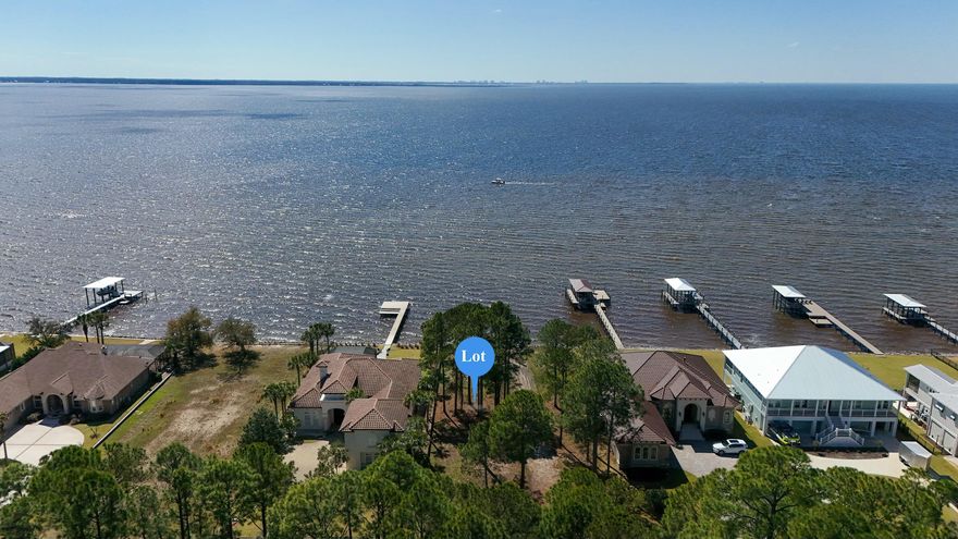 Discover the ultimate waterfront paradise in this exceptional BAY FRONT lot in Freeport, FL that has 80+/- feet of waterfront with seawall & riprap in place. Enjoy breathtaking sunrises and sunsets in this gorgeous waterfront community with wonderful amenities overlooking the Choctawhatchee Bay. HOA membership required with architectural review board requiring 2,000 minimum heated & cooled square footage for waterfront homes. HOA dues are currently only $600 a year. Panoramic views, breathtaking surroundings, city water & sewer available, street lights, community dock, tennis courts, rv/boat storage, 1.75 acre nature preserve, no build out time. Bay Harbour subdivision is a quiet treasure, come make your discovery, fall in love and build your dream retreat. Call today before it's gone.