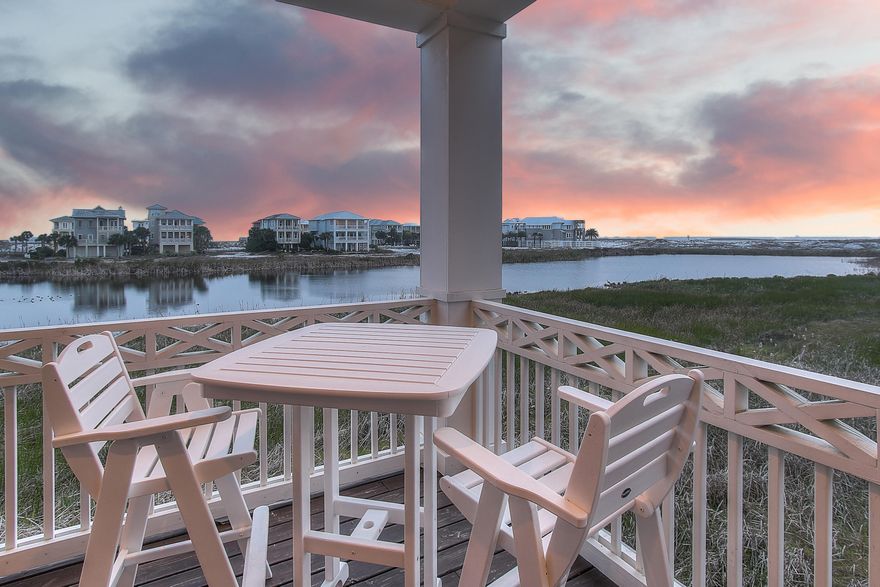 Pristine vistas and exceptional attention to detail define this prominently situated coastal retreat newly completed in 2013. Presiding over 54' of premium lake frontage this property is finely appointed and has been optimized for open living with 5 bedrooms, 4 full bathrooms and an inverted floor plan which allows for beautiful views from the second story living space over the coastal dune lake, Destin's famous East Pass and out toward the emerald green waters of the Gulf. Excellent rental opportunity exists with +$184,000 in projected gross annual income. Interior finishes are impressive with notable features such as tongue & groove ship lap siding, private elevator, ample covered parking and separate storage area, outdoor shower, hand scraped hardwood flooring, custom draperies and