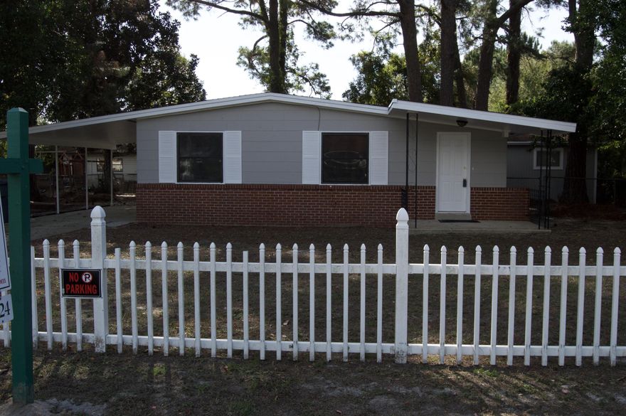 This beautifully remodeled 3 bedroom, 1 bathroom ranch style home, is perfectly placed for buyers looking for a move in ready home. Spacious open floor plan that flows from kitchen to dining to living space. New features include, carpet, tile, paint inside and outside, appliances, AC/HVAC unit, home has all new windows and doors. The laundry room is outside with a fence in yard. located in the heart of Downtown Fort Walton Beach.