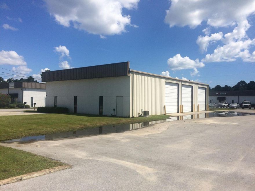 Very affordable 'flex' space (warehouse & office space) for lease. This is a 'modified-gross' rental rate in which the landlord pays the real estate taxes, building insurance, and common area maintenance. Recent leases in the area are at $12.00 NNN per Sq. Ft. The building has #3 - 10' x 12' street-level rollup doors with approximately 2,000 Sq. Ft. of office space and 2,000 Sq. Ft. of warehouse space. The warehouse space also has mezzanine storage above the offices. Small secured fenced storage yard on the south side of the building. The building is being leased 'AS-IS' at this rental rate. Any tenant improvements are to be paid by the tenant. Currently leased to ASP Pool Company who is vacating at the end of January.