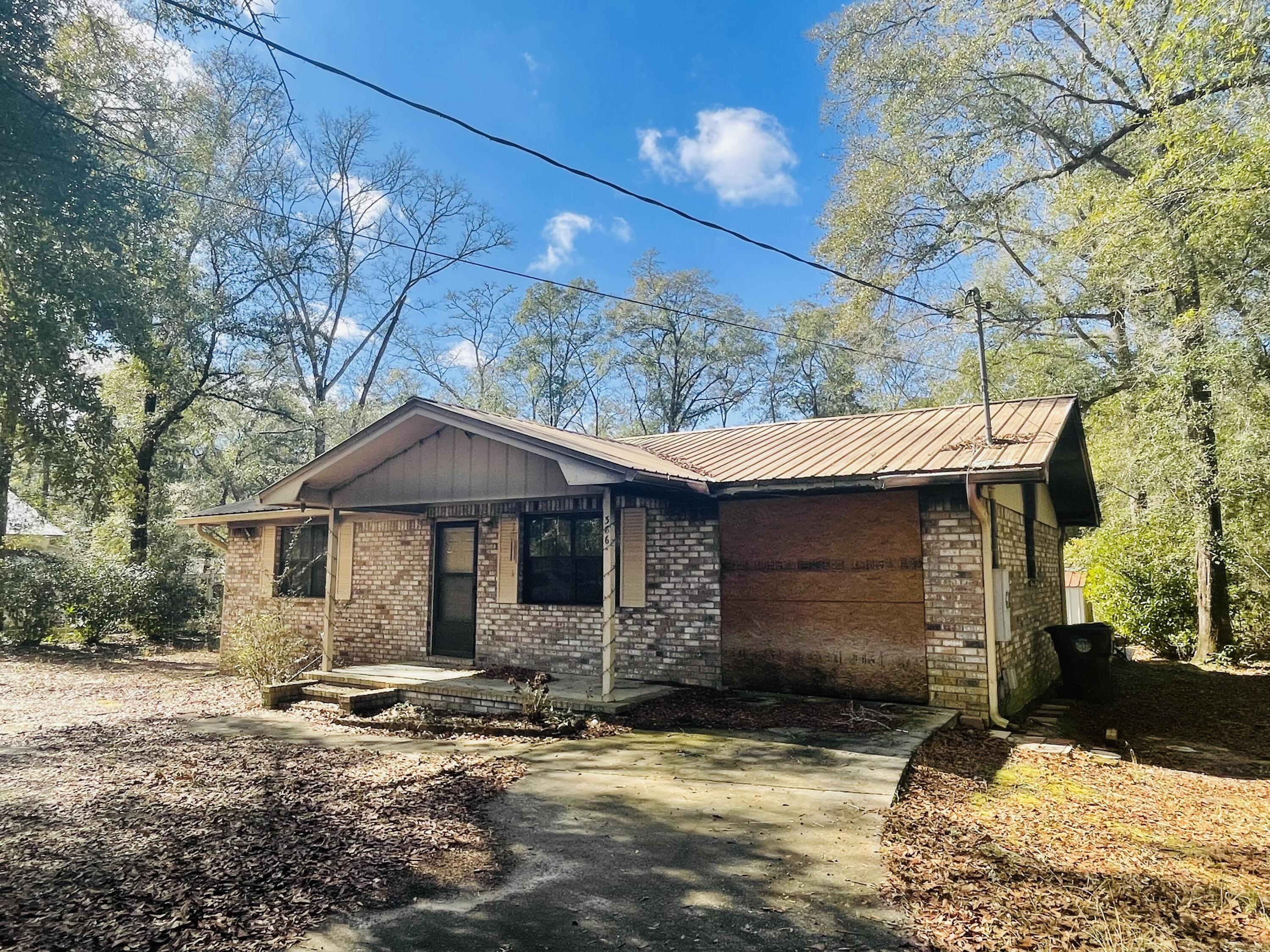 CALLING ALL INVESTORS!!! Check out this great opportunity- the lot, location and bones of this brick home is phenomenal. Now it is time for it to be brought back to its glory days. Home is being sold 'AS IS'.