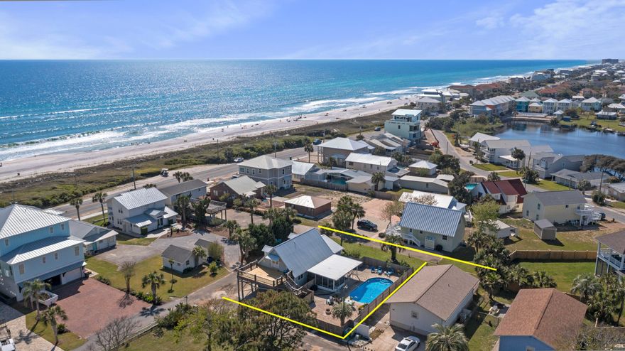 **CURRENTLY UNDER CONTRACT, SELLER WILL CONSIDER BACKUP OFFERS**  STEPS to the beach!This lovely home offers the luxuries of space and privacy as well as dedicated and uncrowded beach access, only for use by Sunnyside owners and guests! This charming cottage sits on an oversized lot and features four bedrooms, spacious kitchen, living, and dining areas, a private fenced-in pool and pool deck, as well as an additional screened in porch living area. There are two bedrooms downstairs and two bedrooms upstairs. This home also features an oversized second floor sunning deck with expansive gulf views, that is accessible from the inside and outside - a perfect space for an additional outdoor dining or living space! An excellent choice for a second home or investment property at the beach!