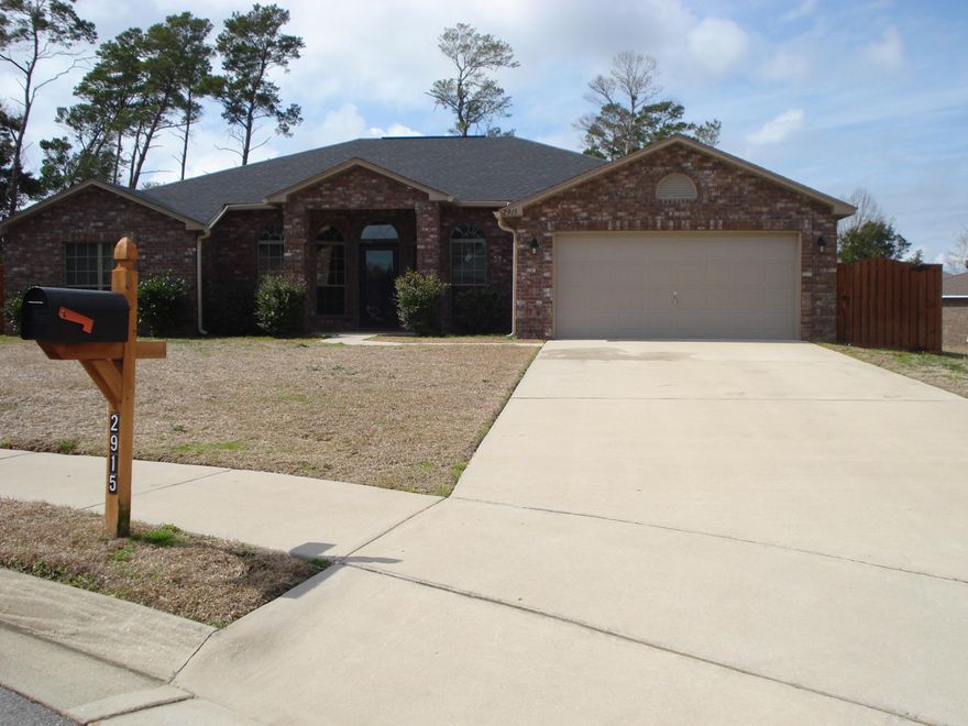 BETTER THAN NEW! Absolutely beautiful all brick home located on cul de sac. This subdivision features paved streets, sidewalks, and underground utilities. Decorative shadowbox private partial fenced big back yard with arch gates, decorative trim wooded area in back. It also has sprinkler system and lawn pump. PRIDE OF OWNERSHIP!!!There are so many upgrades (see photos) to this home that a new home doesn't have. Storm door in front and a double storm door with inside pull up blinds and foot peddle stopper. Extended rear covered patio with pavers and barbecue area. Windows has blinds throughout and covered with window film for energy savings. Step inside this 2,495 SF home with split floor plan that has master bedroom on one side, two bedrooms on other side up front with full bathroom and