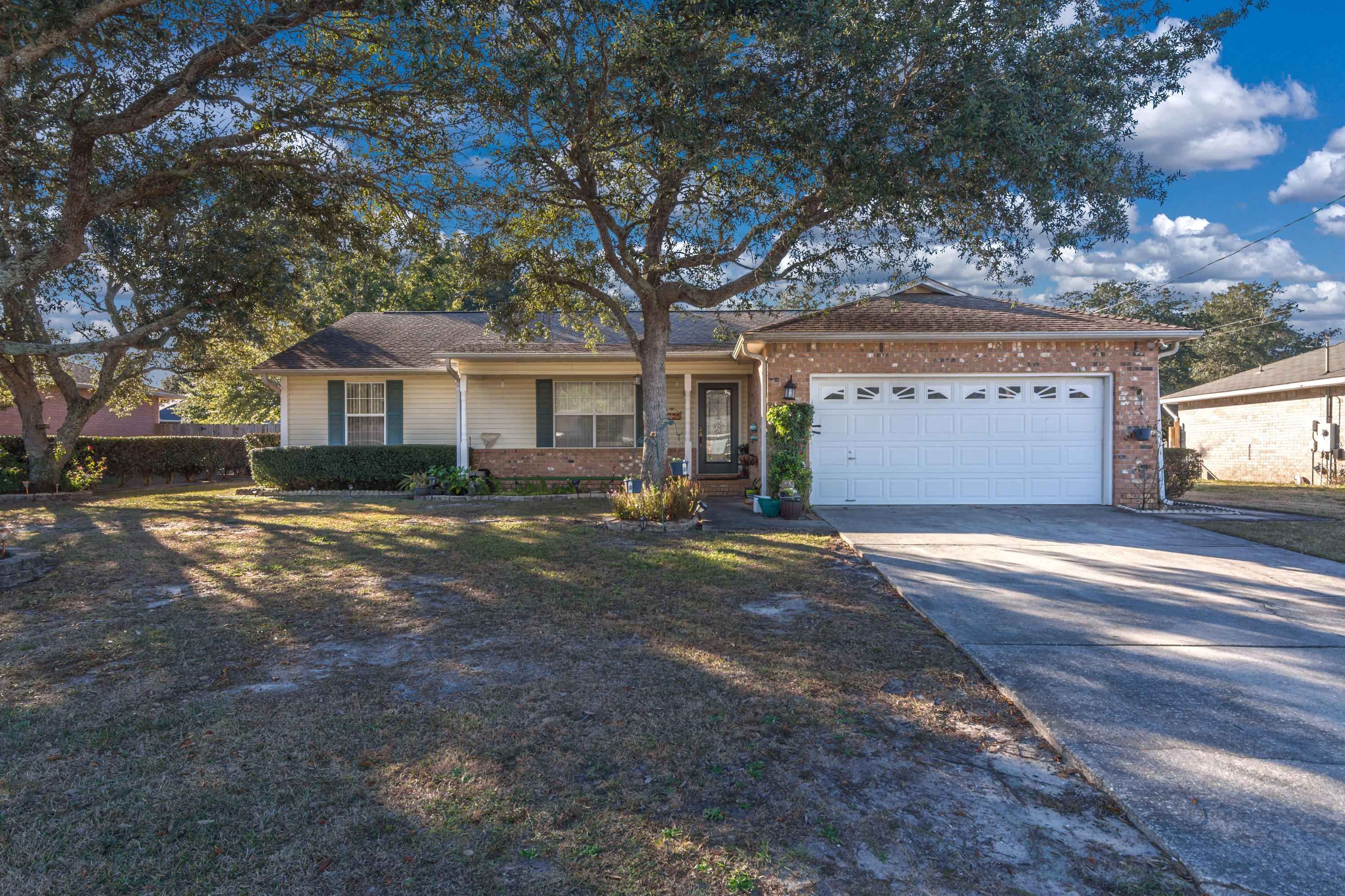 Under Contract with Kick-out Clause.Do you want a salt-water screened in pool? Fabulous location 3 bedroom 2 bath home with loads of updates, and that sparkly pool! Lush privacy fenced 1/3 acre, solid wood floors, granite and quartz countertops, fingerprint-free black stainless appliances less than one year old! Have toys? Store them easily with ample garage space. 2 car attached garage, and an additional garage out back. Need closets? Pantry, linen, walk-in closets in every room, this home is full of storage. 2006 dimensional roof, updated high efficiency HVAC, ceiling fans, and recessed lighting. Quiet street, central location, and no HOA.
