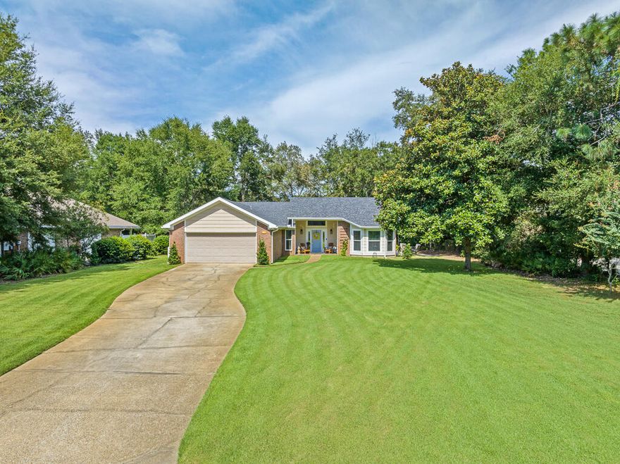 Looking for a home that has it all? Look no further! This stunning 3-bedroom, 2-bathroom home is a perfect blend of style and comfort. Having undergone a full renovation, it features high-end upgrades designed for a custom living experience.From the moment you step in, you're welcomed into a spacious, open-concept living area, highlighted by a beautiful fireplace that adds a warm aesthetic. Overlooking this area is a massive, fully-equipped gourmet kitchen. With a full-size Frigidaire Gallery freezer and a full-size Frigidaire Gallery refrigerator, double ovens, a warming drawer, a 13-foot island and a built-in desk area, you'll have plenty of space to host guests and entertain.