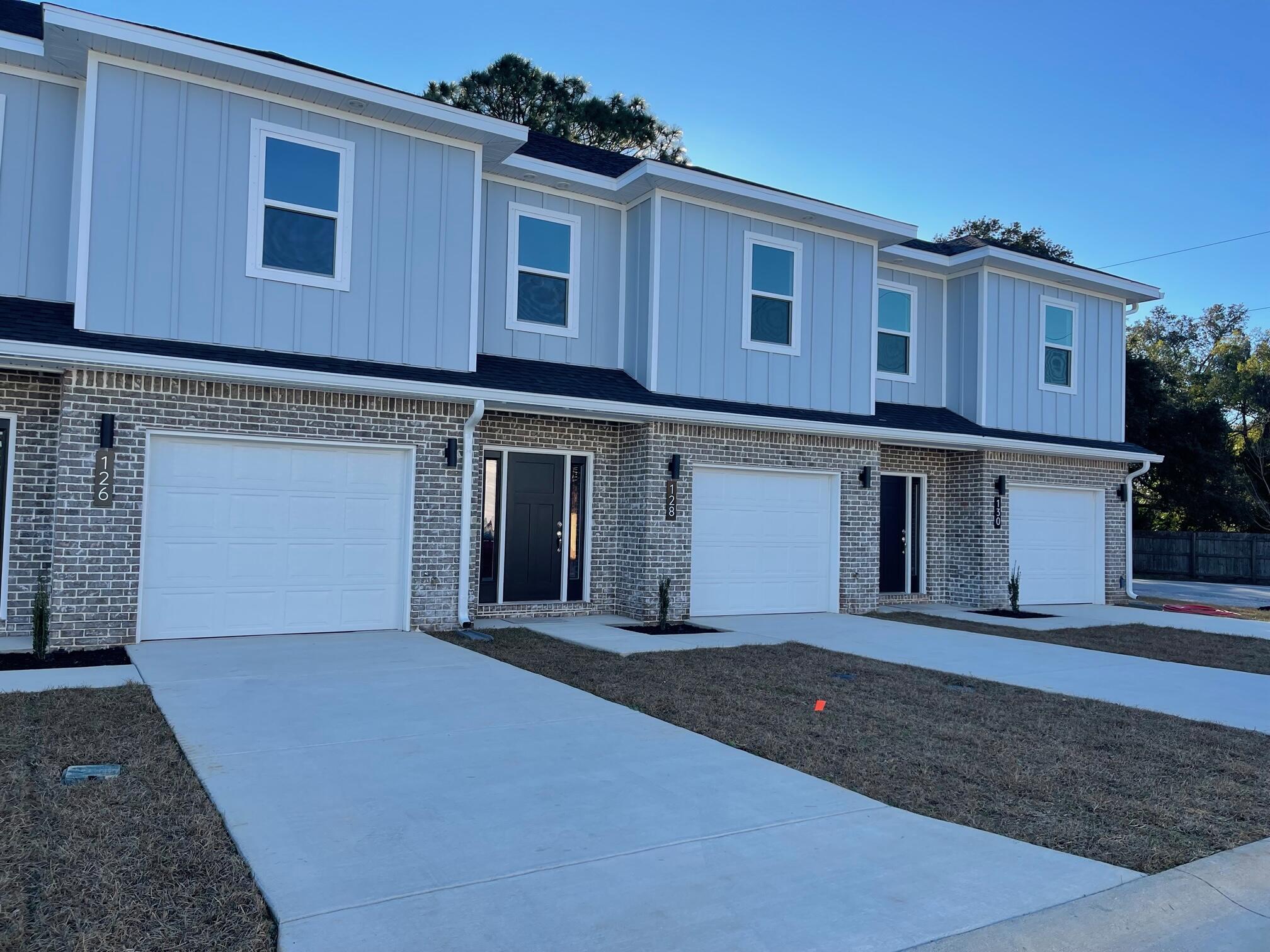 New Construction & Ready to Move In! Builder is giving $10,000 ANYWAY MONEY which makes this a $0 move in if used towards closing costs! Use this money towards an Interest Rate Buy Down, closing costs, and/or washer & dryer!  END UNIT. Luxury Vinyl Plank in living areas & baths. Carpet on stairs & in bedrooms. Upstairs is all bedrooms, full guest bath, on-suite bath for primary & laundry room. Downstairs hallway leads to 1/2 bath, kitchen w/ breakfast peninsula & Upgraded Stainless Appliances such as side by side refrigerator, Self-Cleaning Convection Stove w/ Air Fry, built-in microwave/range hood & dishwasher. Kitchen opens to the living & dining room. Back door leads to privately fenced backyard with a gate on either side. Apoxy Sealed Garage Flooring & Exterior Lights on Automatic Timer