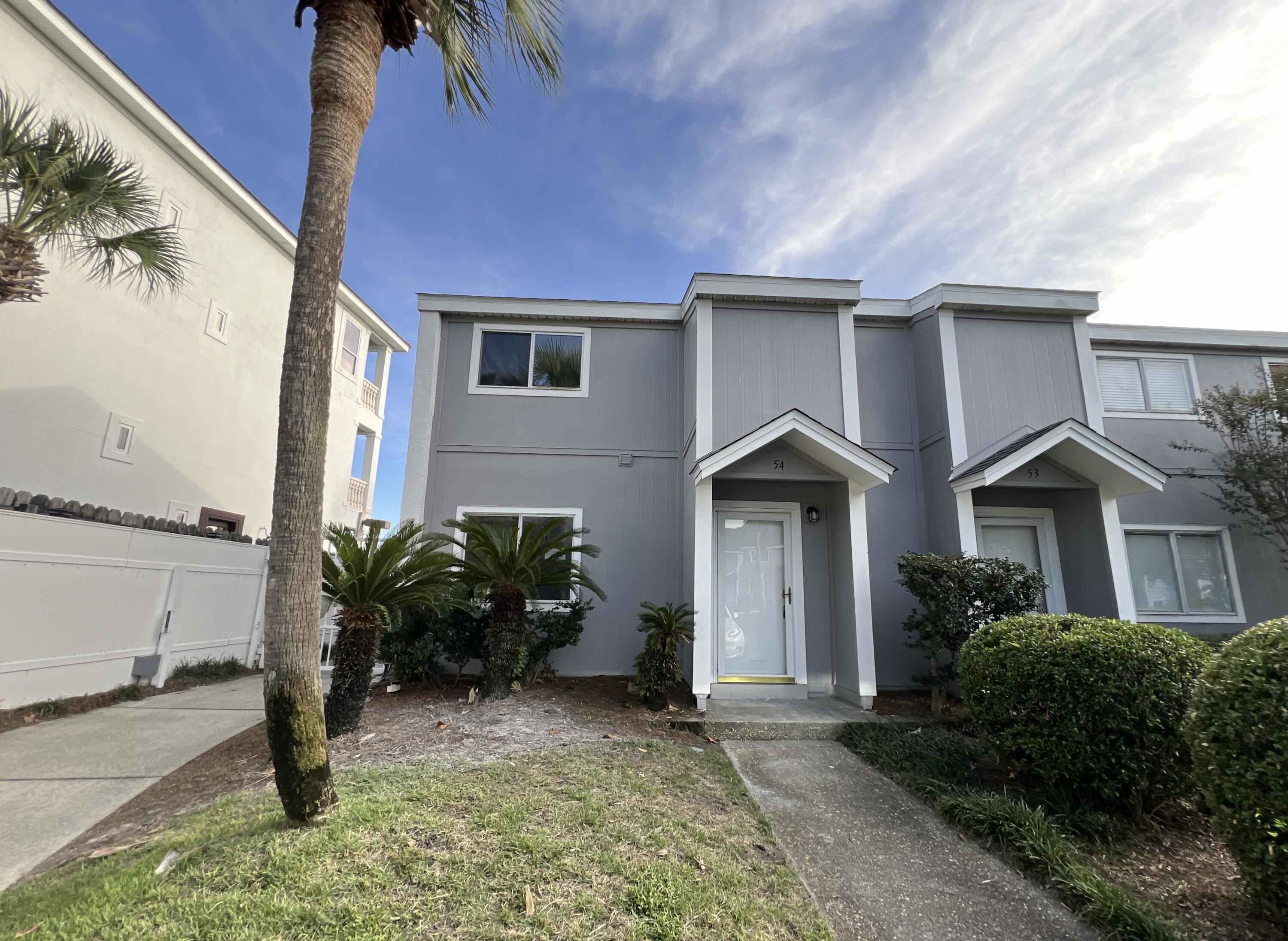 Welcome to your completely renovated 2 Bed, 2.5 Bath REO oasis in Destin. This turn-key unit features stunning views of the serene Lake of South Bay--perfect for a peaceful primary home or high-yield rental. The interior boasts a chic, modern makeover: LVP flooring throughout, fresh paint, and a chef-ready kitchen with elegant granite tops and brand-new stainless steel appliances. This unit was originally built in 1974 and is just under 1200sf. HOA has just installed a new dimensional shingle and continue to make updates to the exterior decking on many of these unit. A must see. Schedule your showing today!