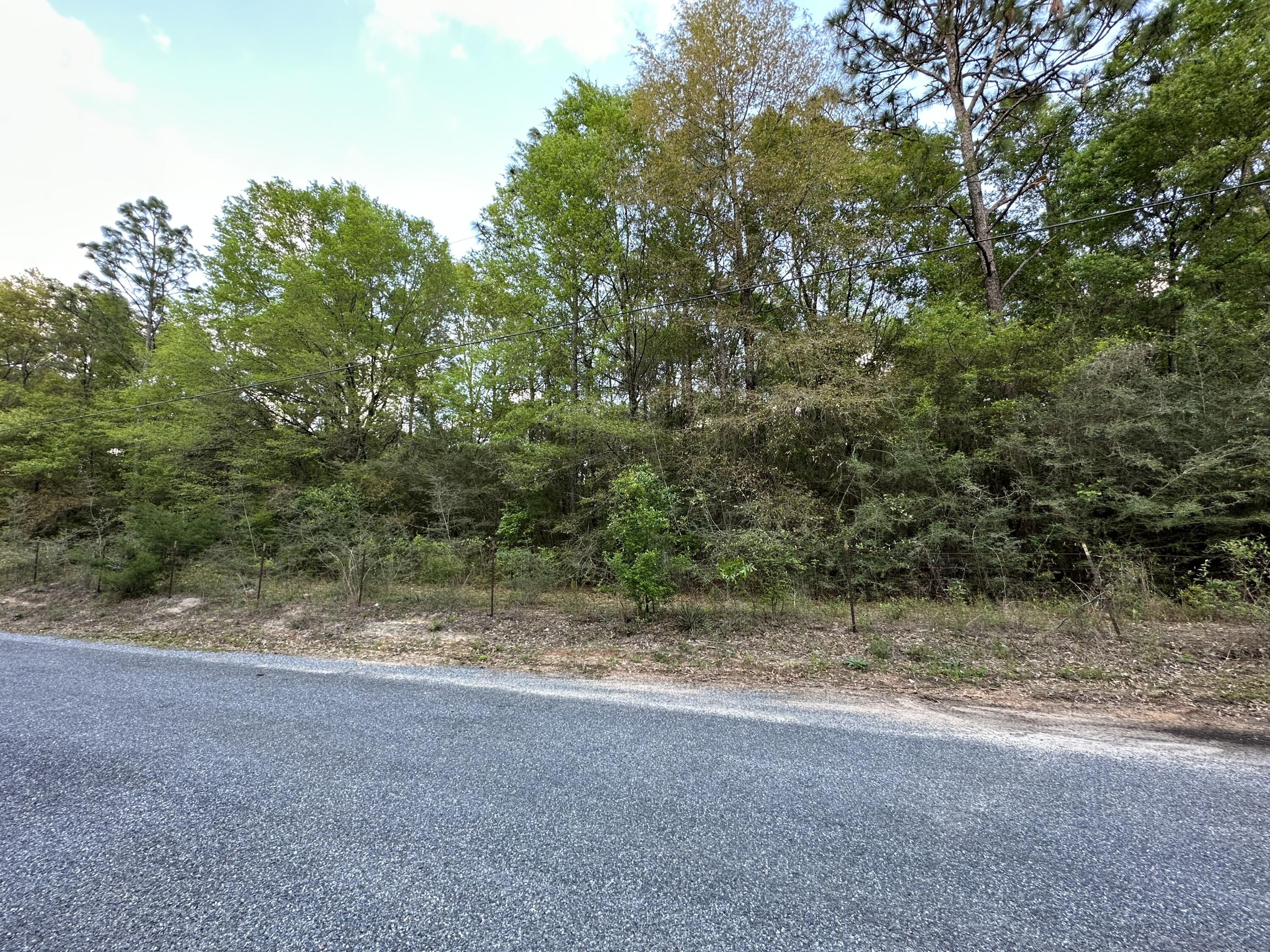 3+/- Acres of Prime land featuring big beautiful oak trees. Come Settle down in your new home. Bring your build plans today! This property features plenty of paved road frontage and is conveniently located north of town with Lots of new growth and just a short drive from local schools, hospital, south Publix, a variety of restaurants and the upcoming Crestview Commons, Hwy 85 and I-10 are in close proximity to the property.County Zoned Rural Residential Lot.subject to county lot split approval.