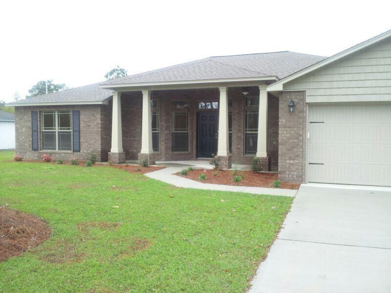 Spacious 4 bedroom 3 bath home with covered rear patio. Double vanity in master bath, with separate shower, granite counters in kitchen.