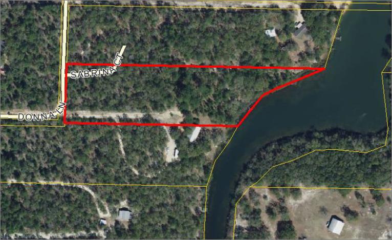 3.77 AC of Flat Waterfront Property just waiting for you to call it home. Just off Hwy 1087, this property is conveniently located for quick access to Hwy 90 to get to Crestview/Niceville. Seller has New Survey, Utilities are available but not currently on property. Come See it Today !