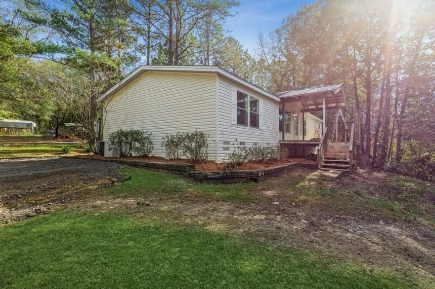 This 4-bedroom 2 bath mobile home as an open concept with a moveable kitchen island. Fresh paint and flooring. New roof in 2021. This property has private access to Yellow River for residents only.Offers- Highest & Best by 5pm, 01/18/2022
