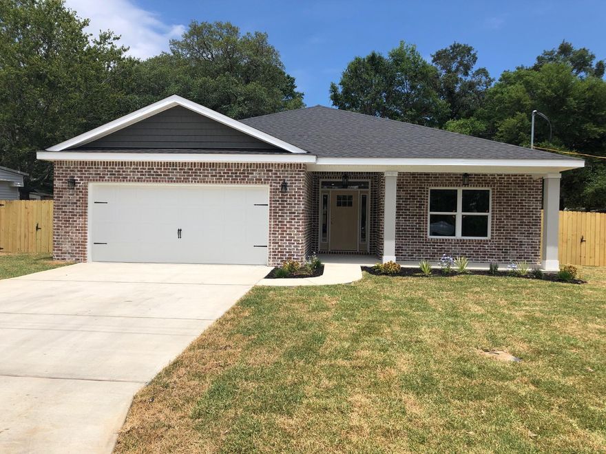 5 bedroom all-brick home with front porch. UNDER CONSTRUCTION-Nearing completion -standard closing. Tile throughout living spaces and bathrooms with carpet in bedrooms. 5 bedroom/3 bathroom home with office/sitting area off master bedroom, open concept floor plan with kitchen and 10' island open to living area and breakfast area. Privately fenced backyard, covered back patio room for a pool. 2 kitchen pantries, stainless appliances, built in microwave, granite counters, soft close cabinetry. Master bath tiled shower/separate tub. Laundry room. 2 car garage. Photos taken 6.2.19. Builder has 5 additional lots on the street and buyer can build to suit