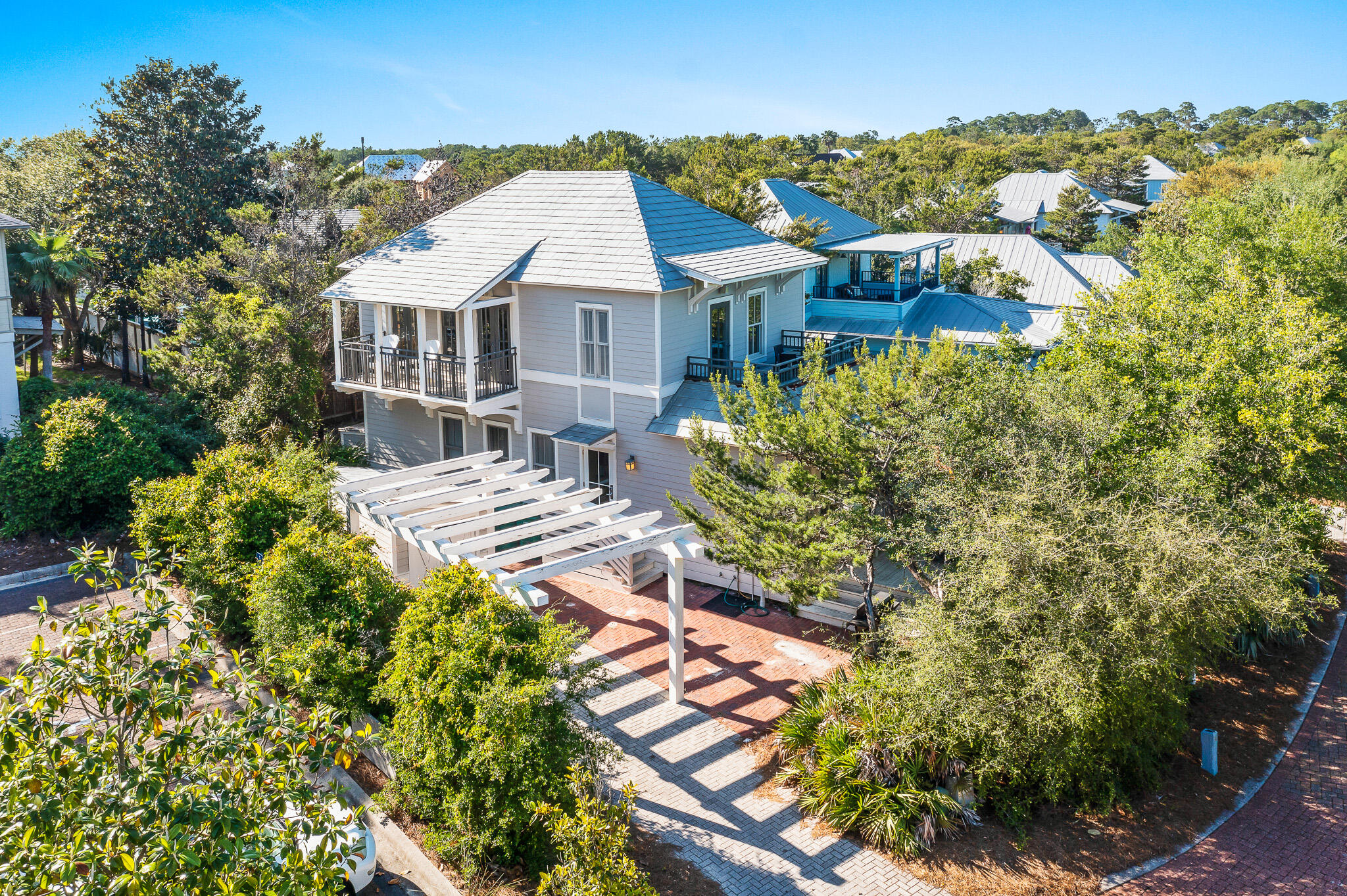 Welcome to 43 Patina Boulevard, the beautiful ''beach cottage'' in the popular Magnolia Cottages By The Sea neighborhood. This adorable fully-furnished 3 bedroom, 4 bathroom home is just steps from the beach, and all the fun! Enjoy time on the beach with friends and family- and enjoy time inside the home with an inverted floorplan (which puts the kitchen upstairs for better views), bunk beds in the hallway, and the living room, dining room and kitchen on the second floor. Enjoy the wonderful community area, located just across from the deeded beach access. The home is close to the heated neighborhood pool, but just far enough away to enjoy a little privacy and security.