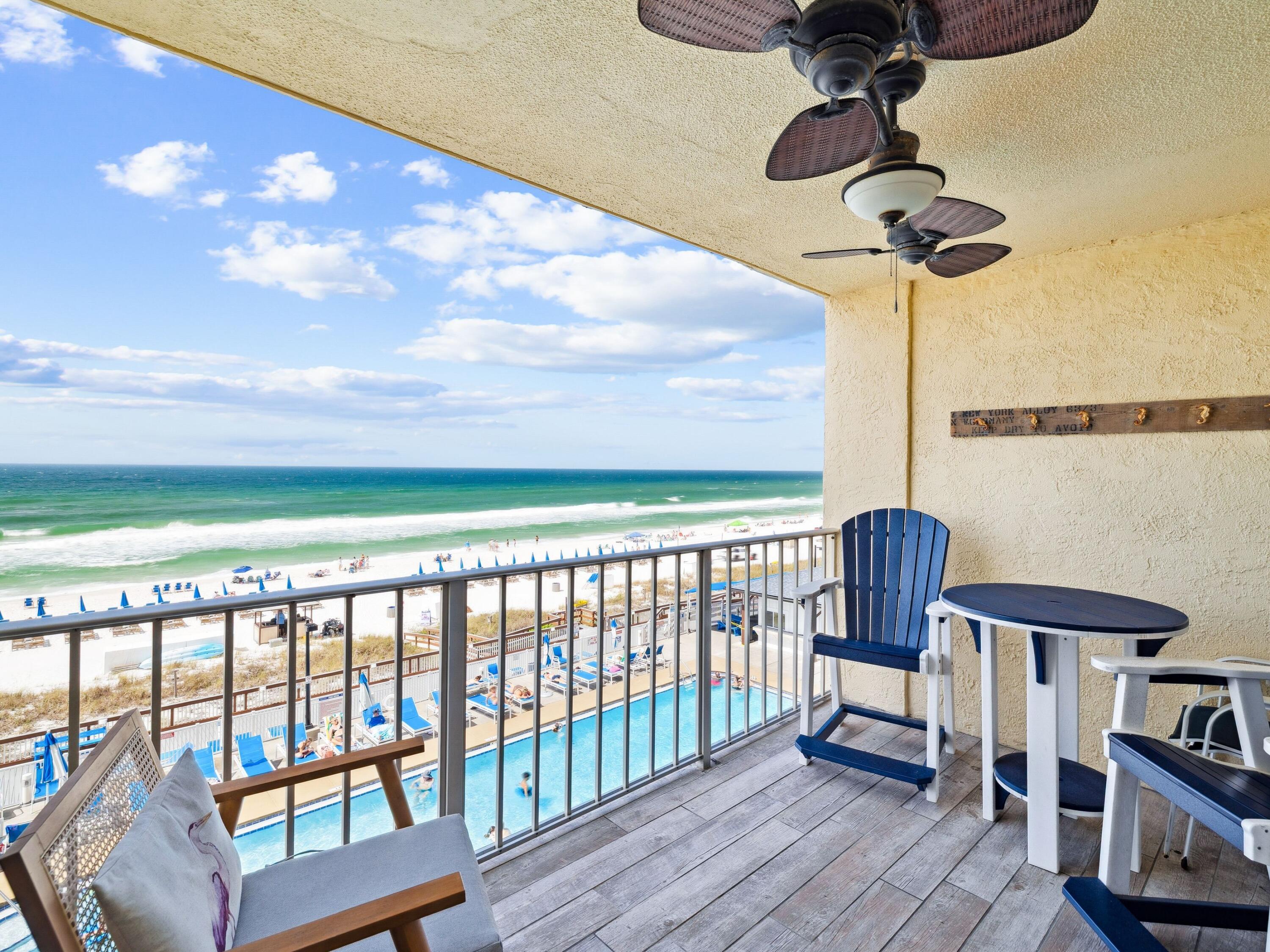 Enviably located for beach vacations, and spacious enough for full-time coastal living, this updated gulf-front condo is a winner. Furnished to a high standard, this two-bedroom, two-bathroom condo features a generous floor plan and a natural flow. The tiled entryway leads into an open kitchen, which is brimming with storage. A full range of white appliances complements black granite countertops and a white tile backsplash. Three stools are lined up, ready for serving breakfast and snacks before heading down to the beach. Contemporary wood tile flooring graces the spacious formal dining area, sitting room and bedrooms. After a busy day, relax on the recliner armchair or put your feet up on the sleeper sofa and watch TV. Throw open the sliding doors onto the balcony and listen to the sound of the waves as the sun sets at the end of each perfect day. Wood tile flooring flows seamlessly outdoors, adding a modern touch to this furnished outdoor space. Situated on the fourth floor, uninterrupted views of the water can be enjoyed above the palm trees while adults can keep a wary eye on kids playing in the resort pool below. This gorgeous beach retreat has two generously sized bedrooms, including a gulf-view master suite with doors opening directly onto the balcony. The ensuite master bath has been updated to include a granite-topped vanity and a modern tiled shower with frameless glass doors. The guest bathroom also has a granite-topped vanity and a shower over the tub. Regency Towers is a vibrant gulf-front resort in Panama City Beach with gated parking and excellent amenities to enhance any vacation experience. Take a dip in two beautiful pools (one heated) while youngsters enjoy their own wading pool. The sandy beach is steps away for morning walks with the pelicans or relaxing on lounge chairs set up by the seasonal beach chair service. Make use of the well-equipped exercise room, or toss burgers on the outdoor grills for a tasty beachside barbecue. Coffee shops, bars and restaurants are all within easy reach, making this the perfect vacation home with rental potential. 